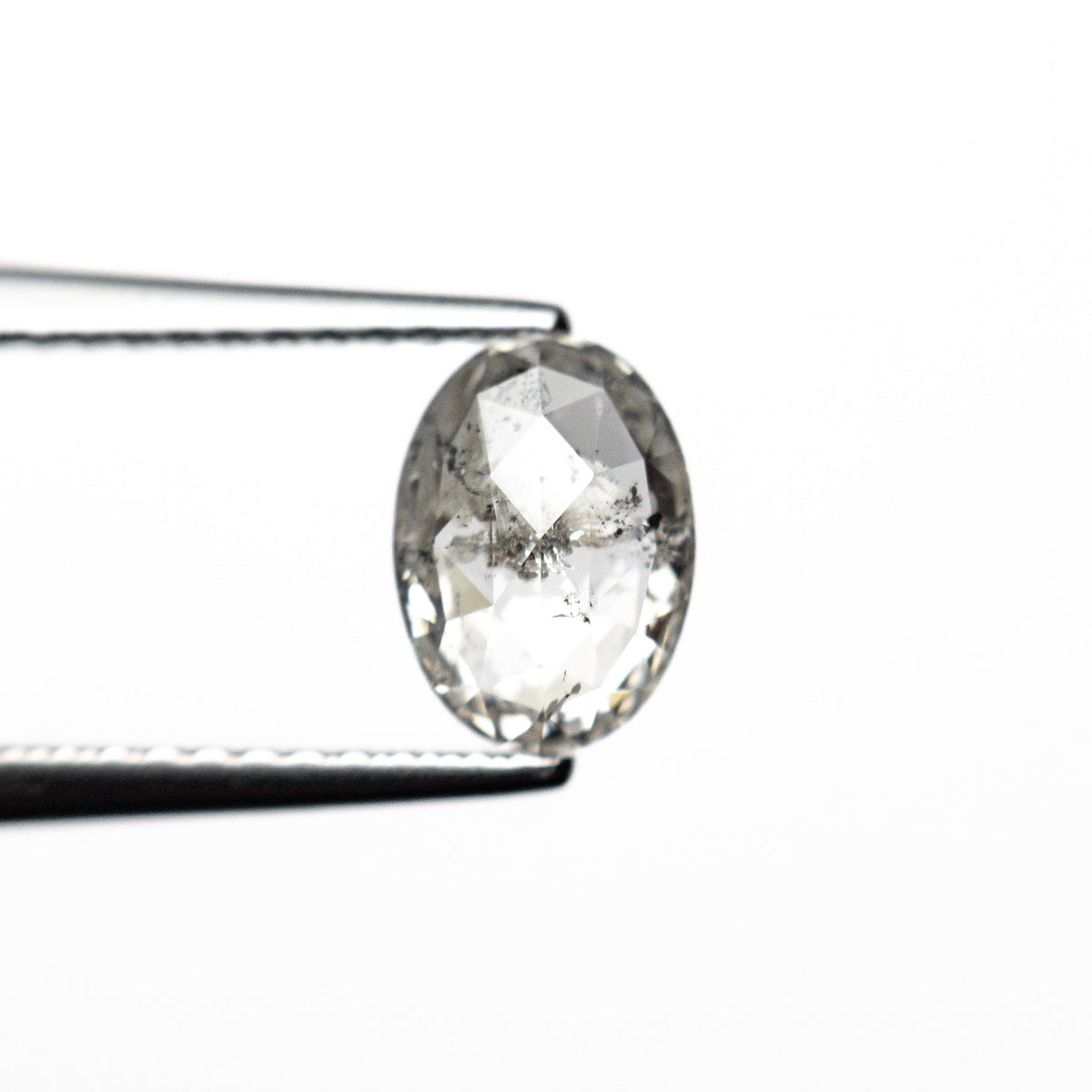 The 1.02ct 7.415.38x2.83mm Oval Rosecut 🇨🇦 26873-01 by East London jeweller Rachel Boston | Discover our collections of unique and timeless engagement rings, wedding rings, and modern fine jewellery.