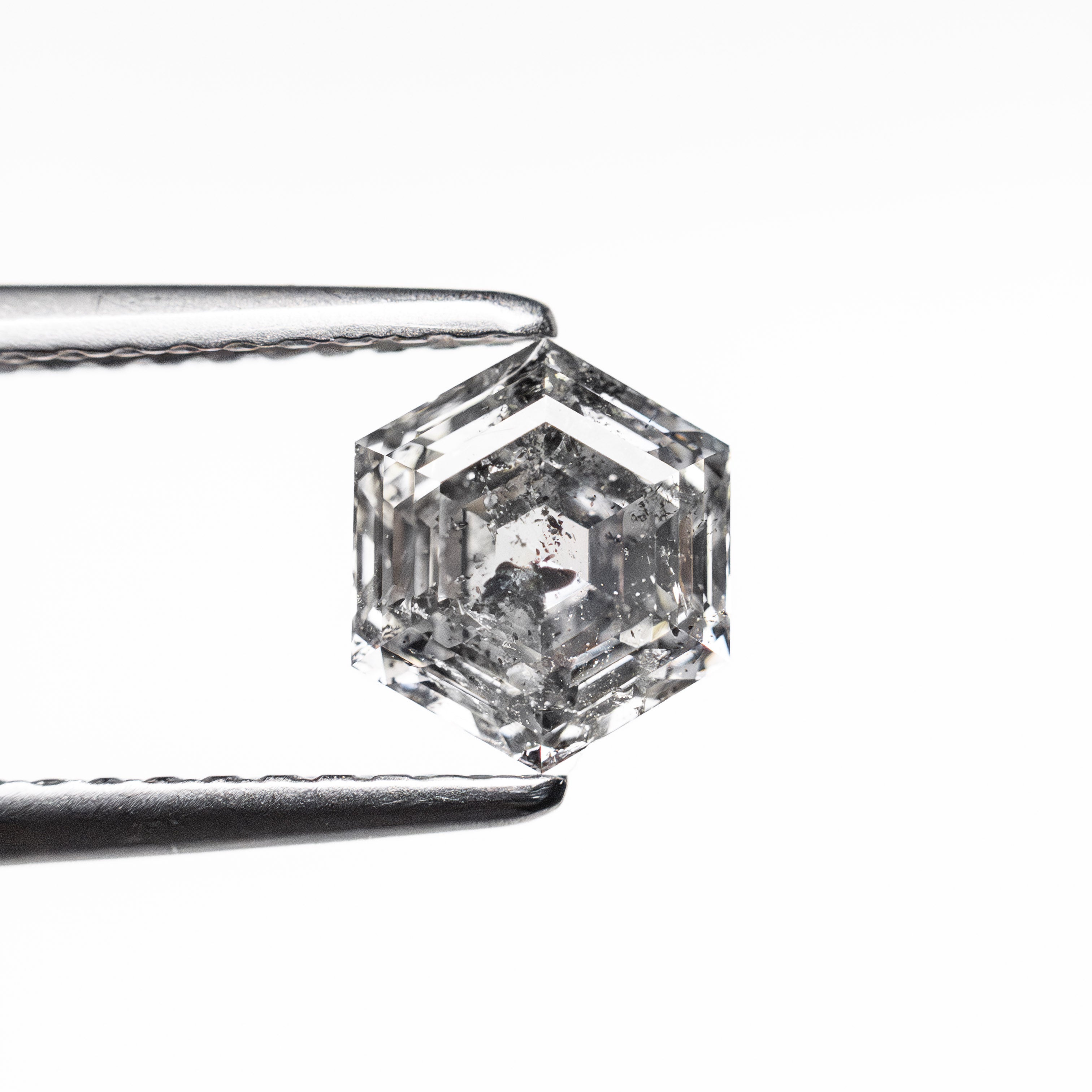 The 1.09ct 6.62x5.76x3.73mm Hexagon Step Cut 🇨🇦 26874-01 by East London jeweller Rachel Boston | Discover our collections of unique and timeless engagement rings, wedding rings, and modern fine jewellery.