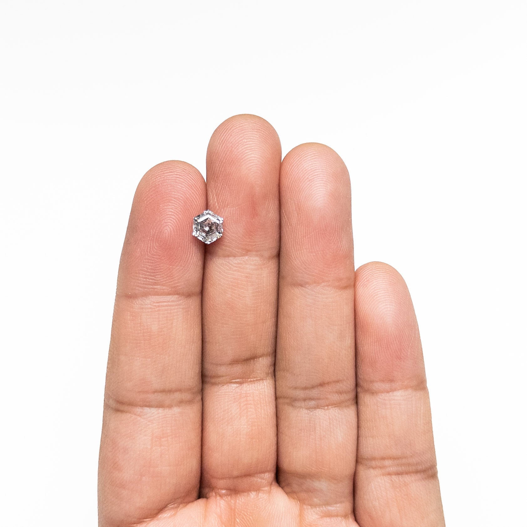 The 1.09ct 6.62x5.76x3.73mm Hexagon Step Cut 🇨🇦 26874-01 by East London jeweller Rachel Boston | Discover our collections of unique and timeless engagement rings, wedding rings, and modern fine jewellery.