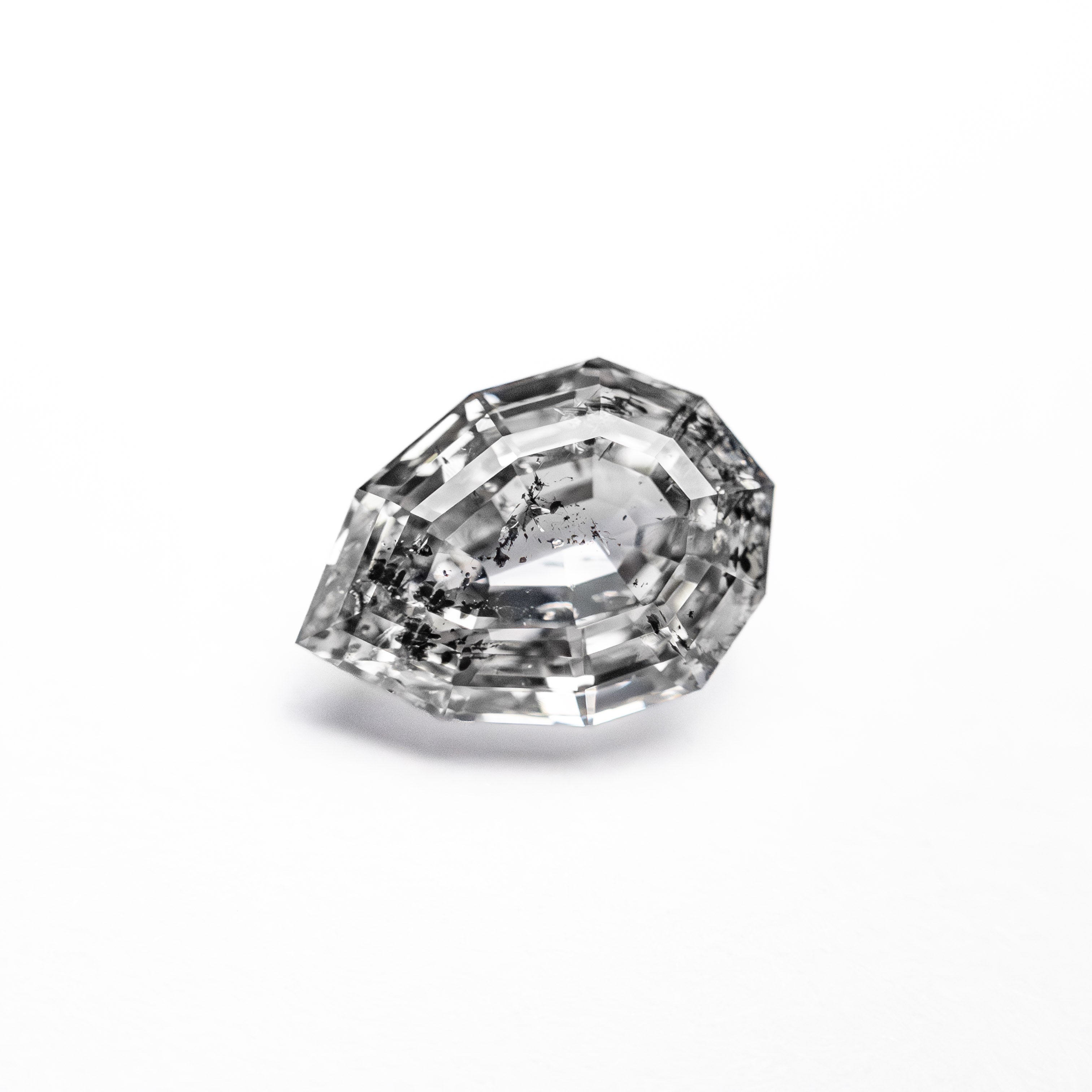 The 1.10ct 7.91x5.51x3.39mm Geo Pear Step Cut 🇨🇦 26879-01 by East London jeweller Rachel Boston | Discover our collections of unique and timeless engagement rings, wedding rings, and modern fine jewellery.
