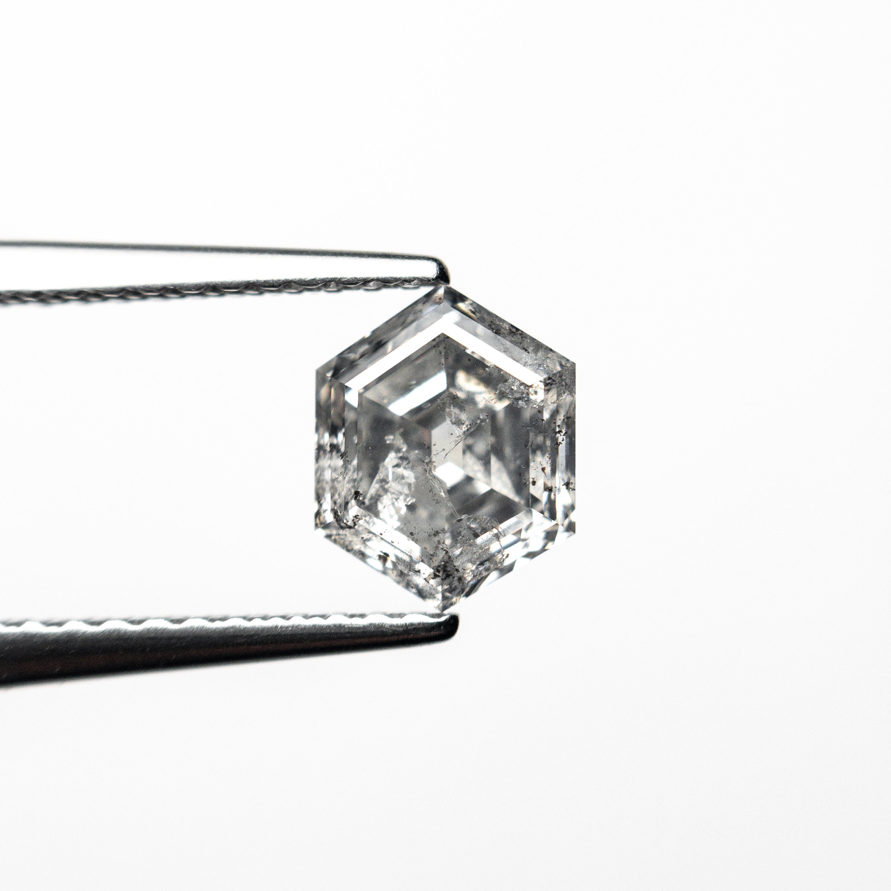 The 1.10ct 7.09x5.60x3.65mm Hexagon Step Cut 🇨🇦 26884-01 by East London jeweller Rachel Boston | Discover our collections of unique and timeless engagement rings, wedding rings, and modern fine jewellery.