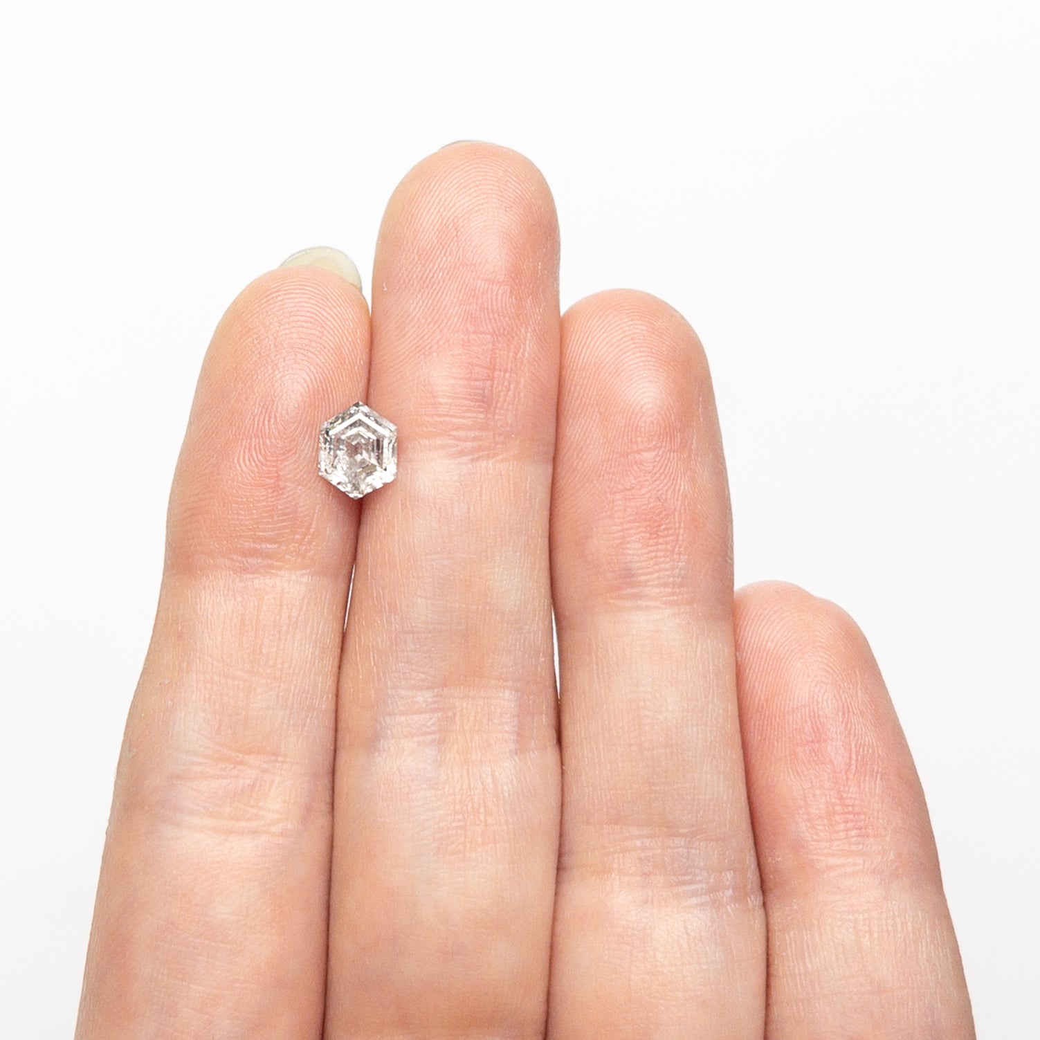 The 1.10ct 7.09x5.60x3.65mm Hexagon Step Cut 🇨🇦 26884-01 by East London jeweller Rachel Boston | Discover our collections of unique and timeless engagement rings, wedding rings, and modern fine jewellery.