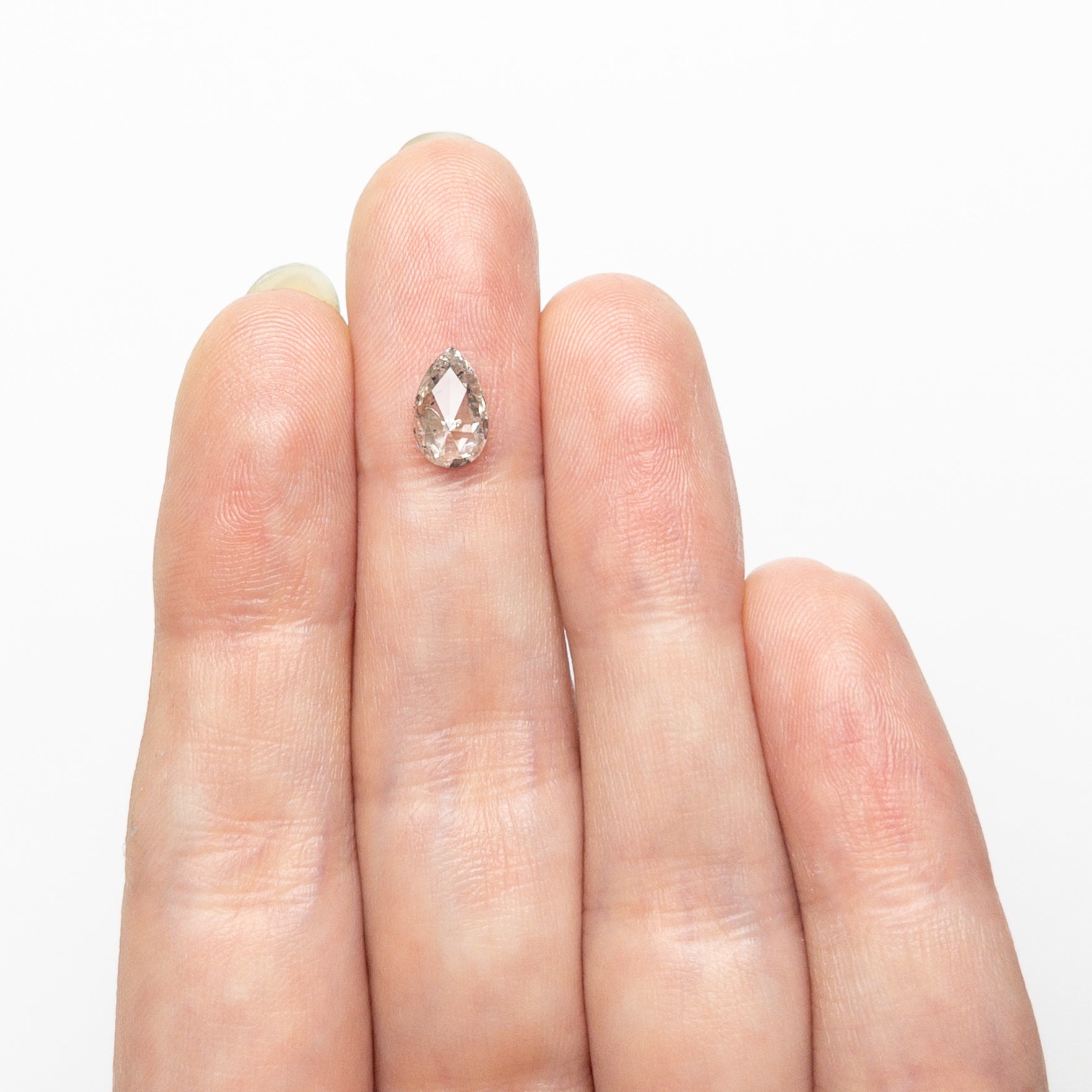 The 0.96ct 8.19x5.12x2.78mm Pear Rosecut 🇨🇦 26890-01 by East London jeweller Rachel Boston | Discover our collections of unique and timeless engagement rings, wedding rings, and modern fine jewellery.