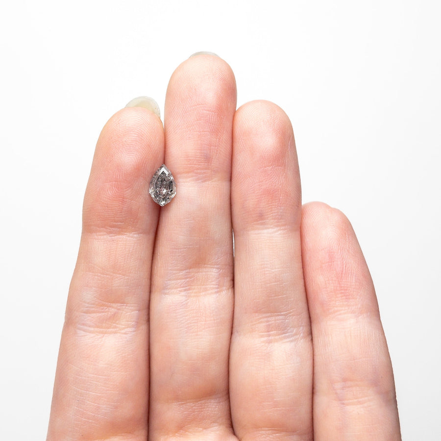 The 0.88ct 7.82x4.88x3.23mm Geo Pear Step Cut 🇨🇦 26891-01 by East London jeweller Rachel Boston | Discover our collections of unique and timeless engagement rings, wedding rings, and modern fine jewellery. - Rachel Boston Jewellery