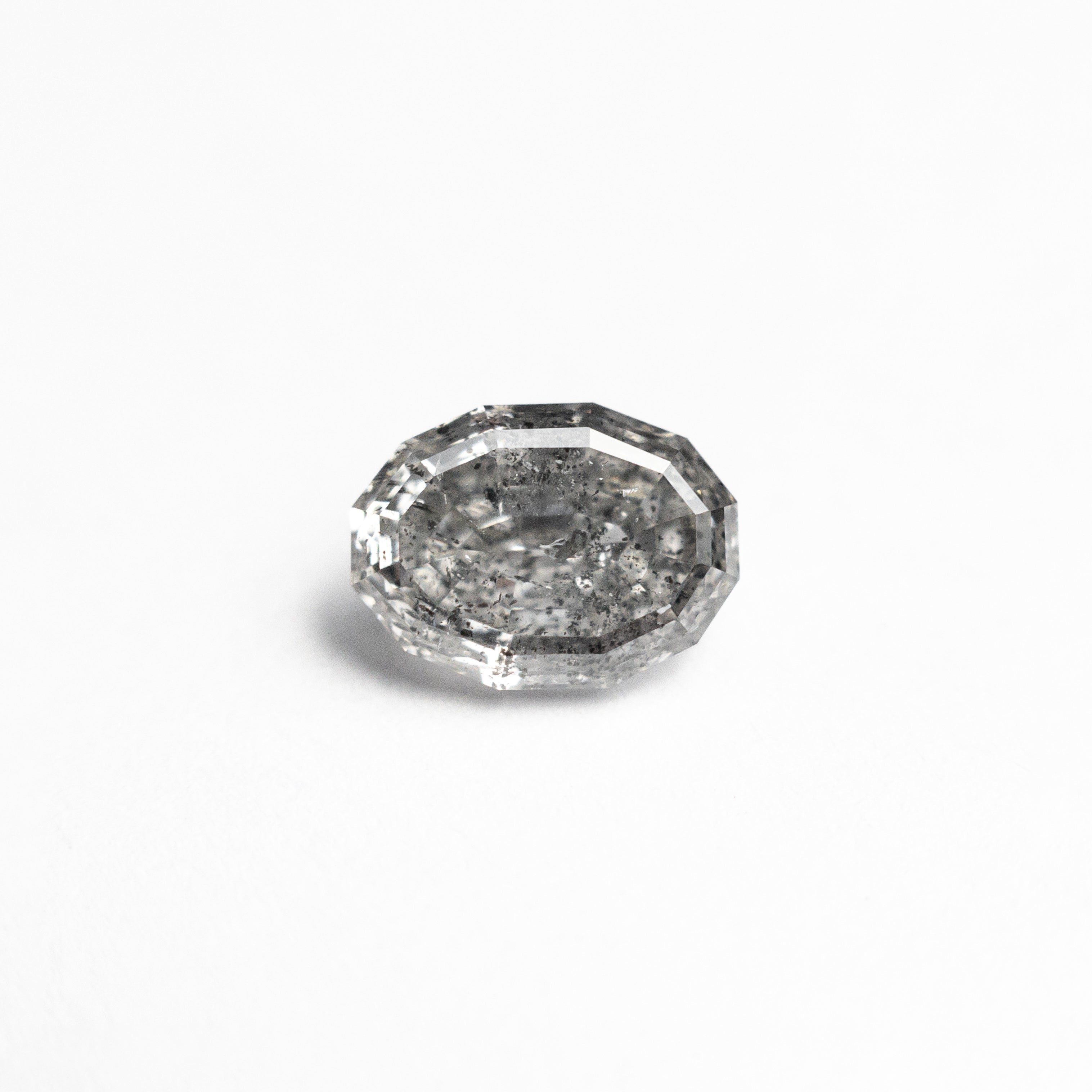 The 0.93ct 6.74x4.96x3.31mm Geo Oval Step Cut 🇨🇦 26894-01 by East London jeweller Rachel Boston | Discover our collections of unique and timeless engagement rings, wedding rings, and modern fine jewellery.