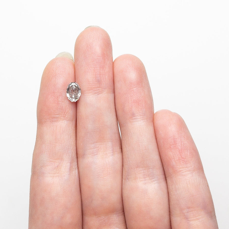 The 0.93ct 6.74x4.96x3.31mm Geo Oval Step Cut 🇨🇦 26894-01 by East London jeweller Rachel Boston | Discover our collections of unique and timeless engagement rings, wedding rings, and modern fine jewellery. - Rachel Boston Jewellery