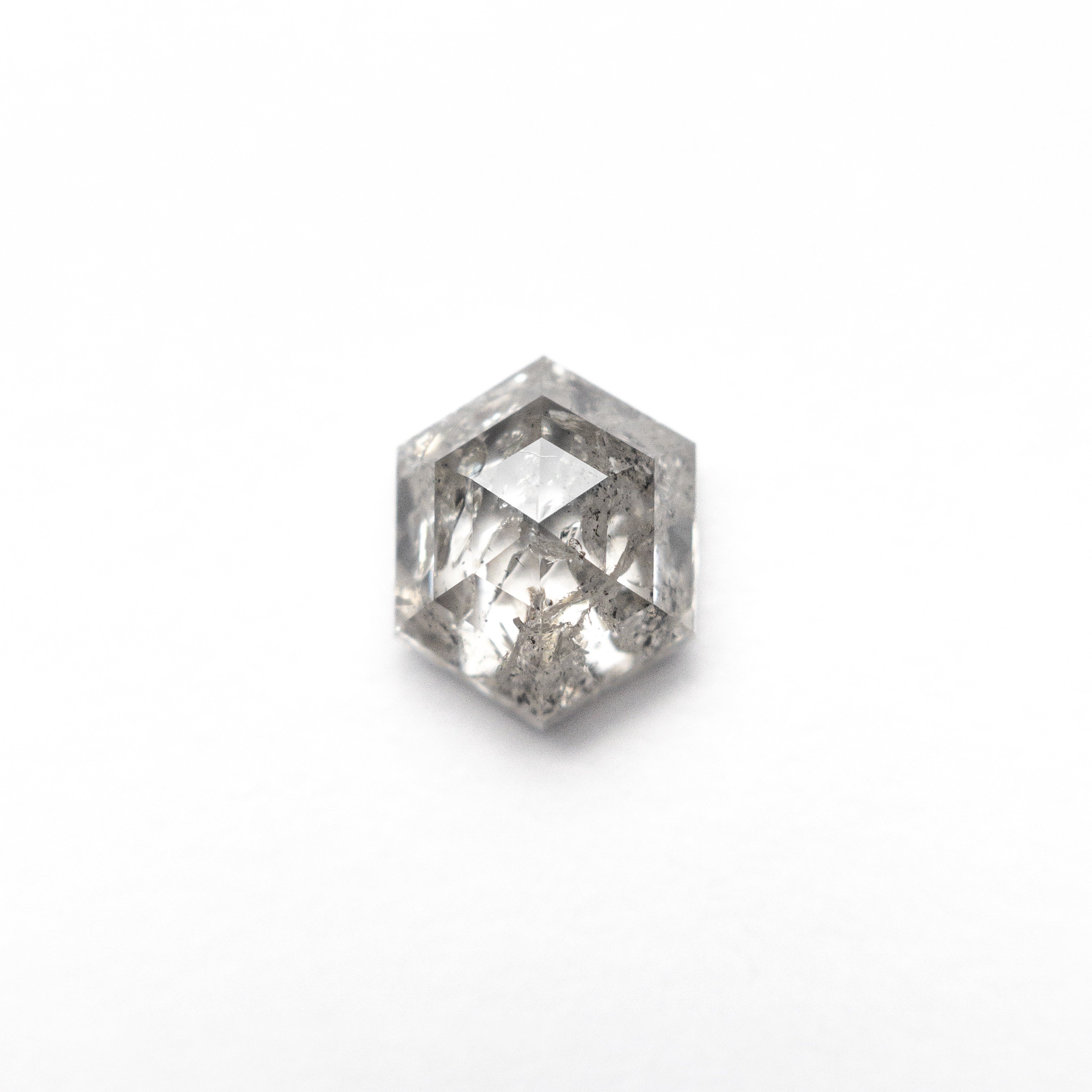 The 1.04ct 6.70x5.51x3.42mm Hexagon Step Cut 🇨🇦 26897-01 by East London jeweller Rachel Boston | Discover our collections of unique and timeless engagement rings, wedding rings, and modern fine jewellery.