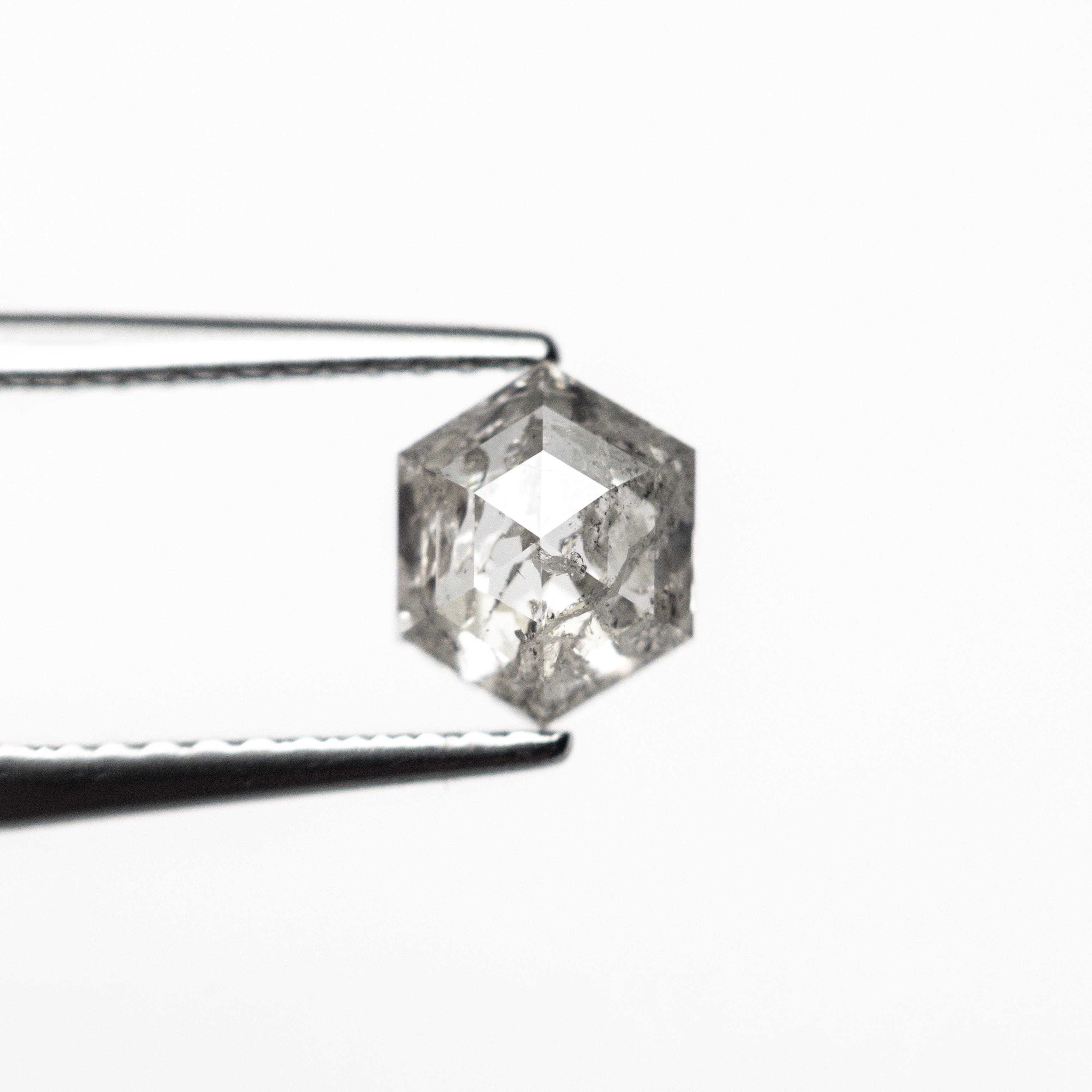 The 1.04ct 6.70x5.51x3.42mm Hexagon Step Cut 🇨🇦 26897-01 by East London jeweller Rachel Boston | Discover our collections of unique and timeless engagement rings, wedding rings, and modern fine jewellery.