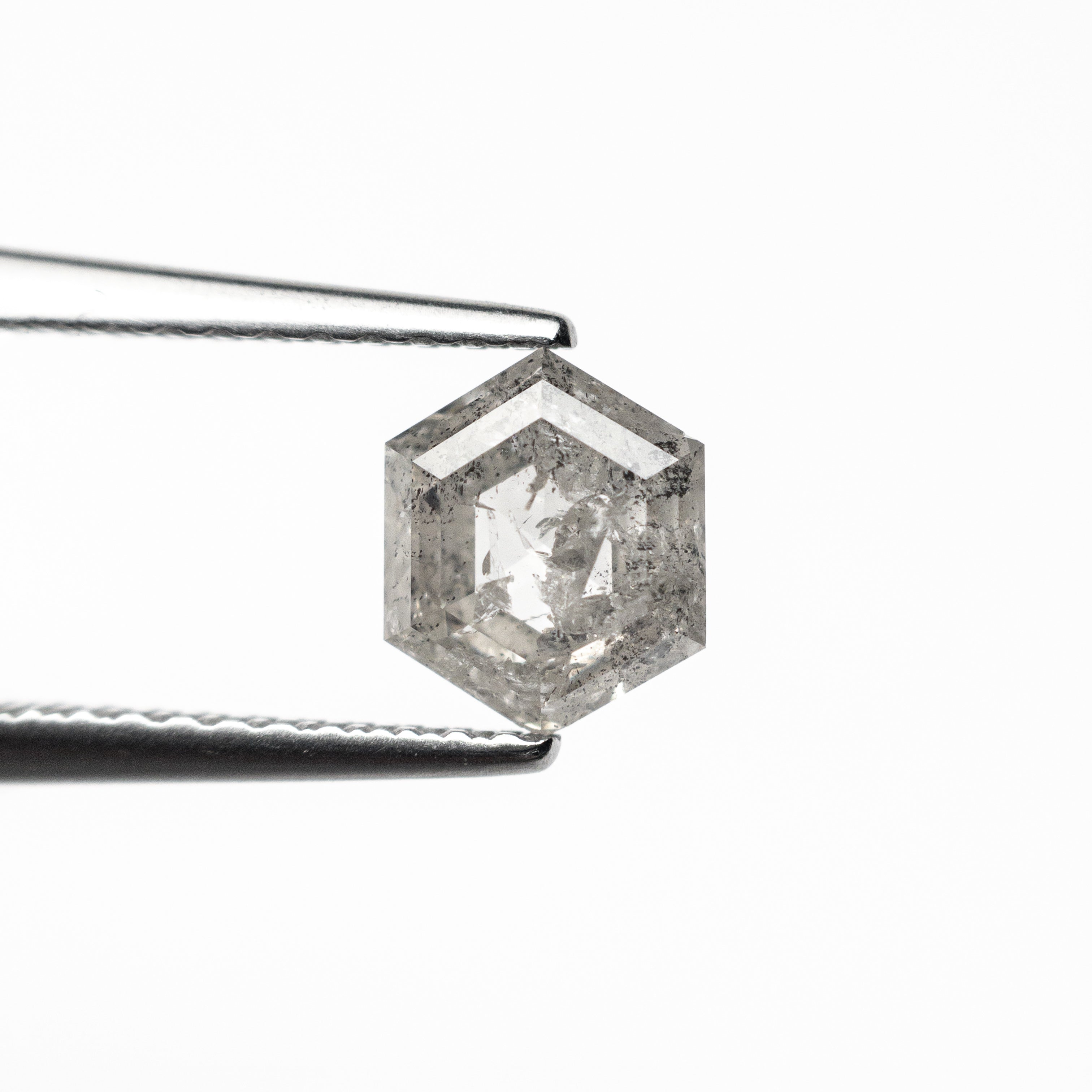 The 1.04ct 6.70x5.51x3.42mm Hexagon Step Cut 🇨🇦 26897-01 by East London jeweller Rachel Boston | Discover our collections of unique and timeless engagement rings, wedding rings, and modern fine jewellery.