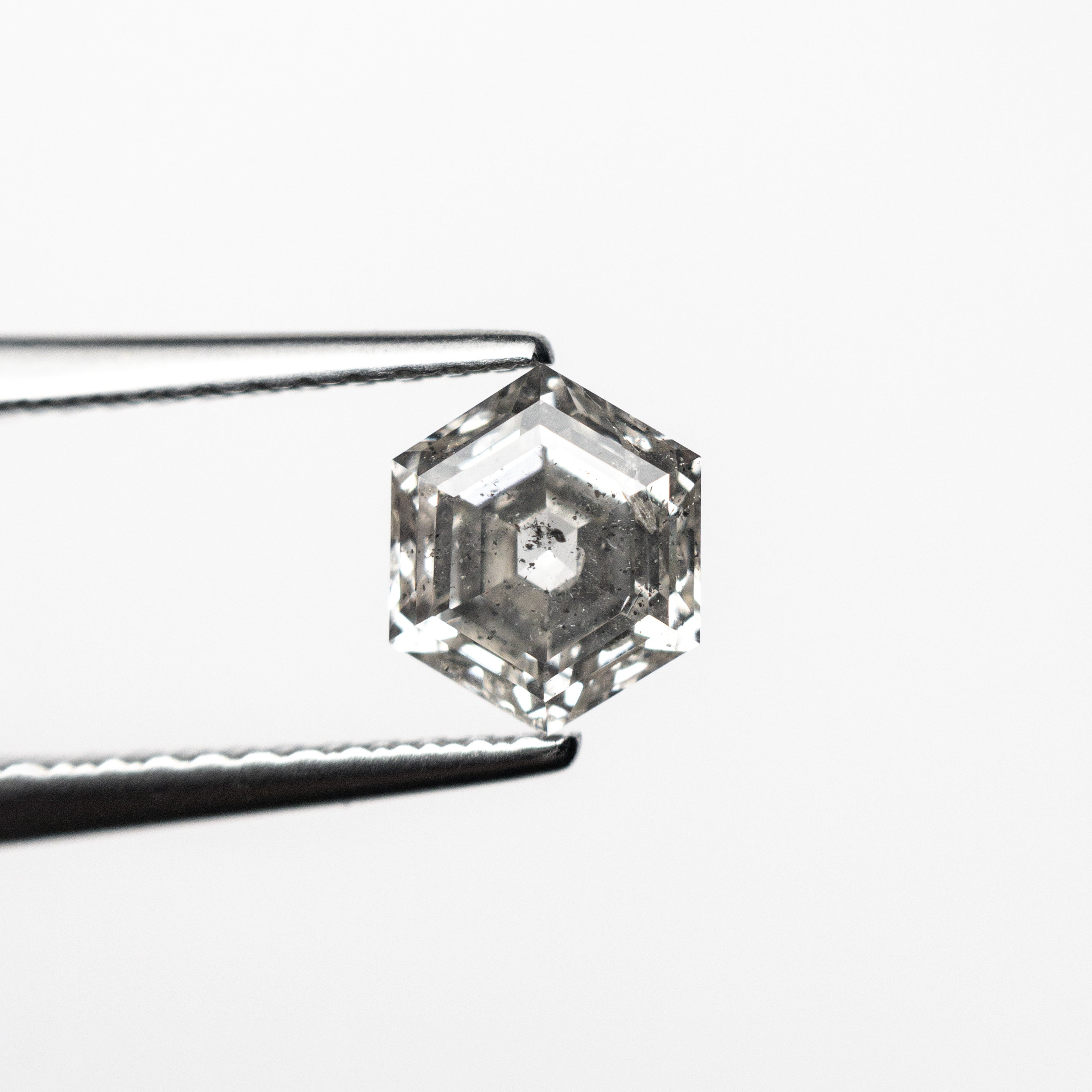 The 0.88ct 6.46x5.40x3.40mm Hexagon Step Cut 🇨🇦 26902-01 by East London jeweller Rachel Boston | Discover our collections of unique and timeless engagement rings, wedding rings, and modern fine jewellery.