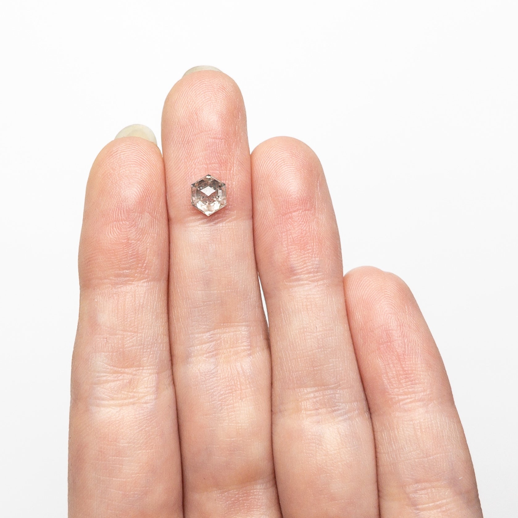 The 0.88ct 6.46x5.40x3.40mm Hexagon Step Cut 🇨🇦 26902-01 by East London jeweller Rachel Boston | Discover our collections of unique and timeless engagement rings, wedding rings, and modern fine jewellery.