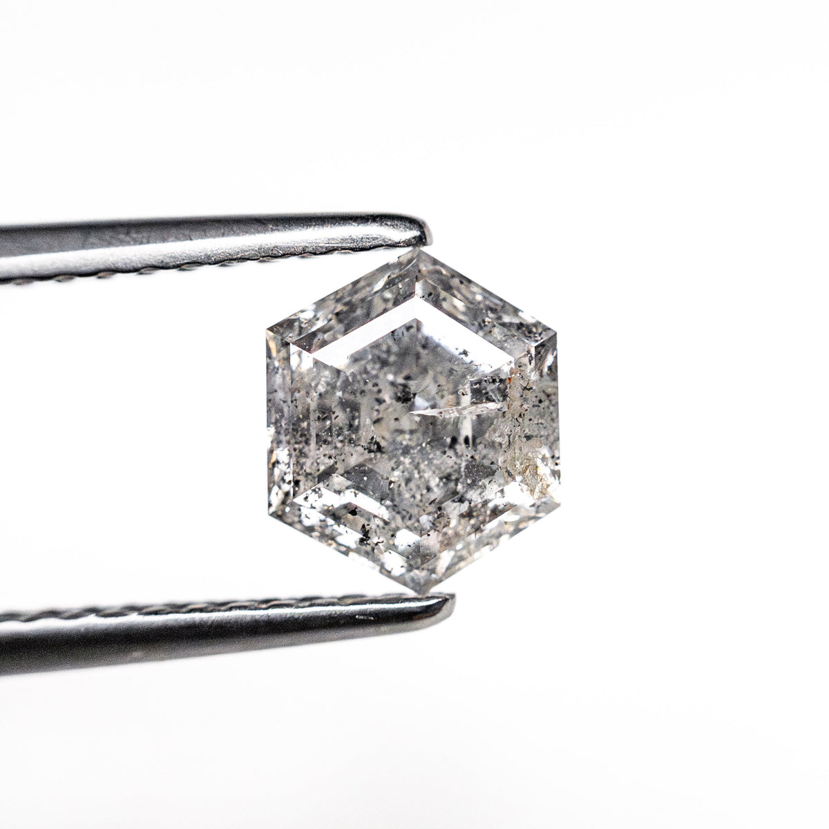 The 1.17ct 7.03x5.93x4.06mm Hexagon Step Cut 🇨🇦 26912-01 by East London jeweller Rachel Boston | Discover our collections of unique and timeless engagement rings, wedding rings, and modern fine jewellery.