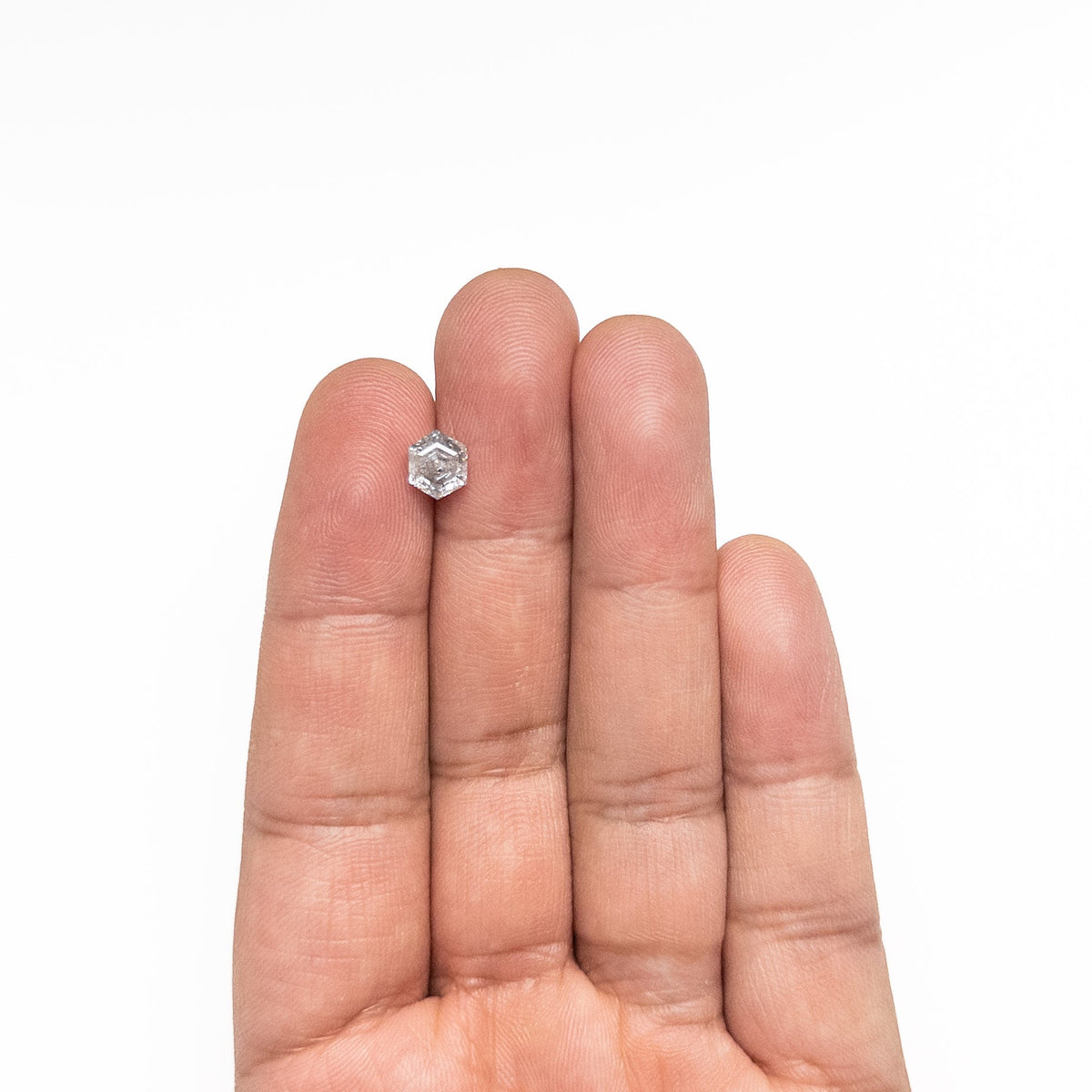 The 1.17ct 7.03x5.93x4.06mm Hexagon Step Cut 🇨🇦 26912-01 by East London jeweller Rachel Boston | Discover our collections of unique and timeless engagement rings, wedding rings, and modern fine jewellery.