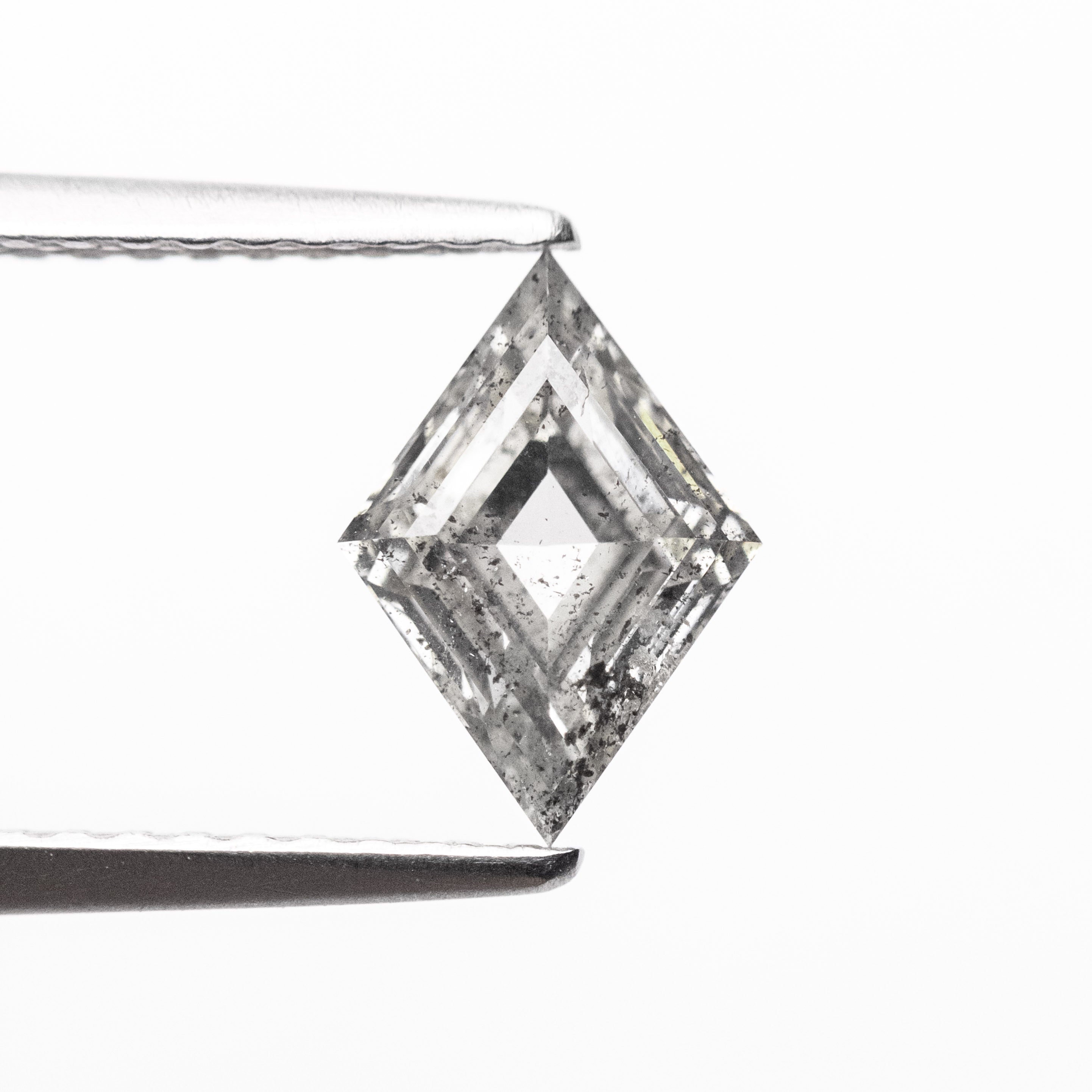 The 0.96ct 8.82x6.20x3.37mm Lozenge Step Cut 🇨🇦 26931-01 by East London jeweller Rachel Boston | Discover our collections of unique and timeless engagement rings, wedding rings, and modern fine jewellery.