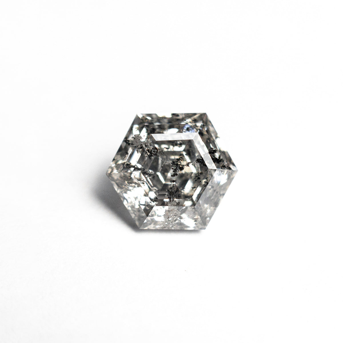 The 1.39ct 7.30x6.46x4.35mm Hexagon Step Cut 🇨🇦 26934-01 by East London jeweller Rachel Boston | Discover our collections of unique and timeless engagement rings, wedding rings, and modern fine jewellery.