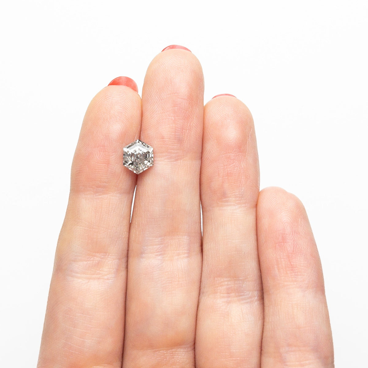 The 1.39ct 7.30x6.46x4.35mm Hexagon Step Cut 🇨🇦 26934-01 by East London jeweller Rachel Boston | Discover our collections of unique and timeless engagement rings, wedding rings, and modern fine jewellery.