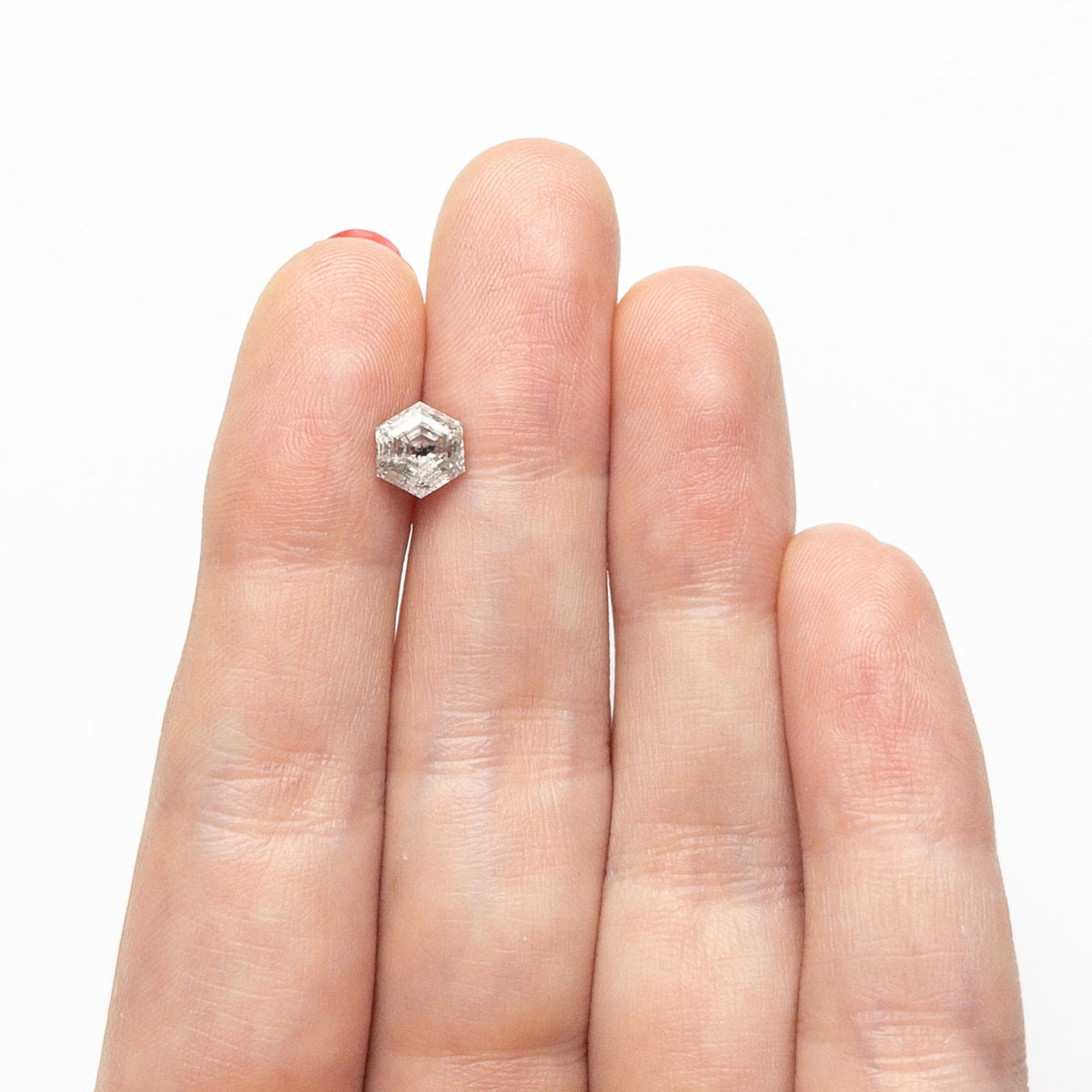 The 1.29ct 6.95x5.84x4.03mm Hexagon Step Cut 🇨🇦 26943-01 by East London jeweller Rachel Boston | Discover our collections of unique and timeless engagement rings, wedding rings, and modern fine jewellery.