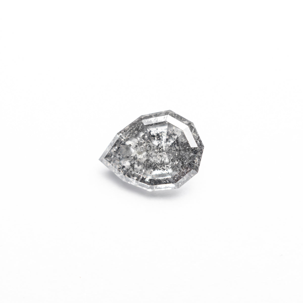 The 0.58ct 6.52x4.77x2.68mm Geo Pear Step Cut 🇨🇦 26952-01 by East London jeweller Rachel Boston | Discover our collections of unique and timeless engagement rings, wedding rings, and modern fine jewellery.