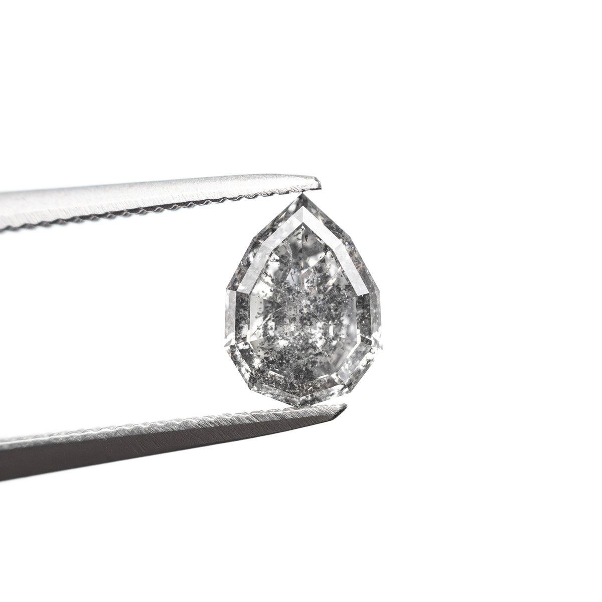 The 0.58ct 6.52x4.77x2.68mm Geo Pear Step Cut 🇨🇦 26952-01 by East London jeweller Rachel Boston | Discover our collections of unique and timeless engagement rings, wedding rings, and modern fine jewellery.