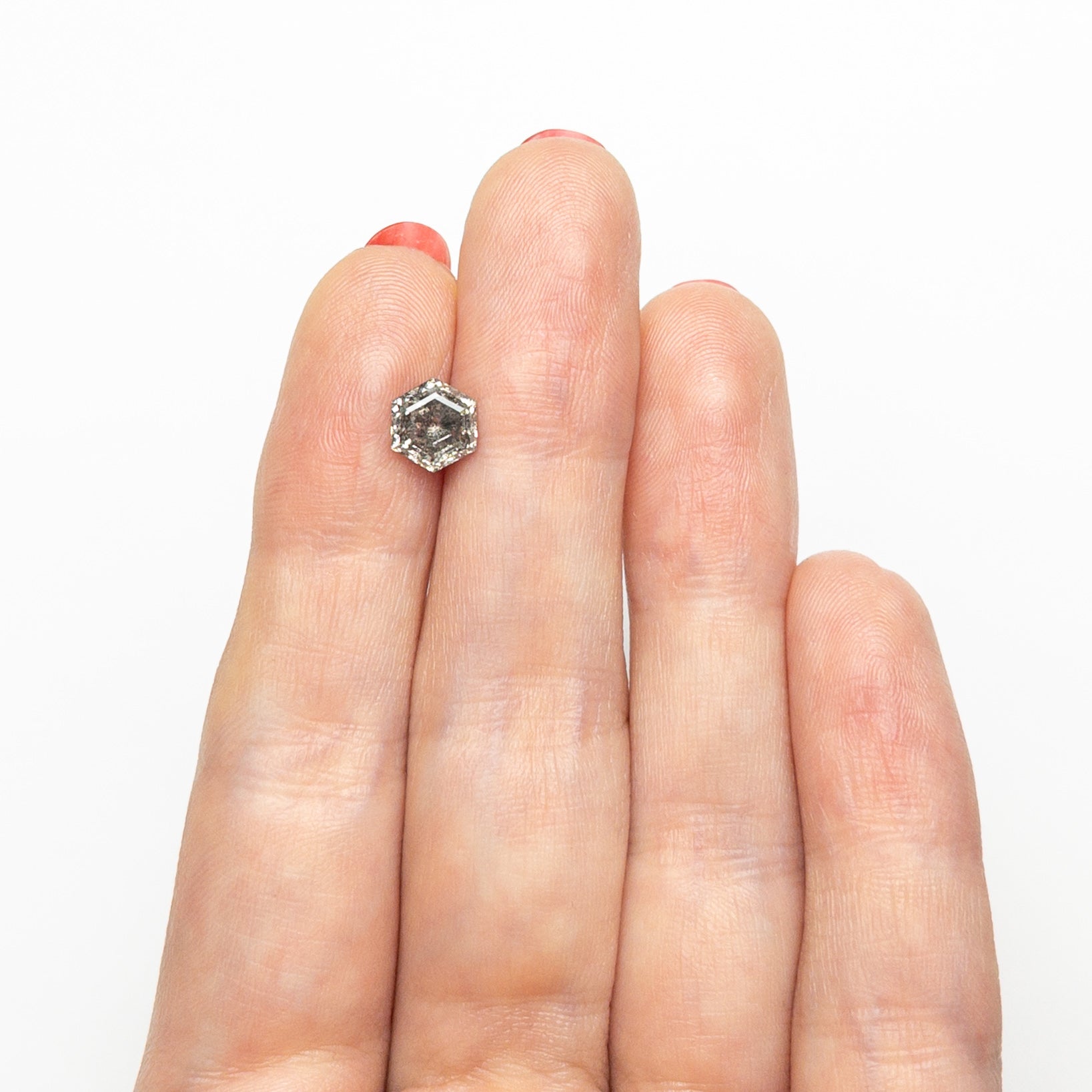 The 1.29ct 7.02x6.26x3.86mm Hexagon Step Cut 🇨🇦 26953-01 by East London jeweller Rachel Boston | Discover our collections of unique and timeless engagement rings, wedding rings, and modern fine jewellery.