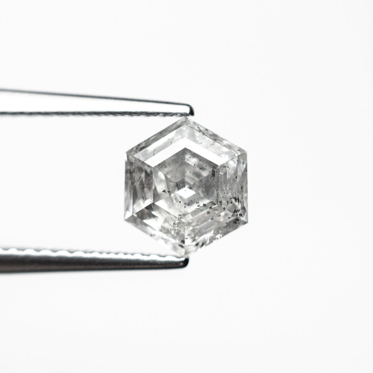 The 1.30ct 7.22x6.35x3.97mm Hexagon Step Cut 🇨🇦 26954-01 by East London jeweller Rachel Boston | Discover our collections of unique and timeless engagement rings, wedding rings, and modern fine jewellery.