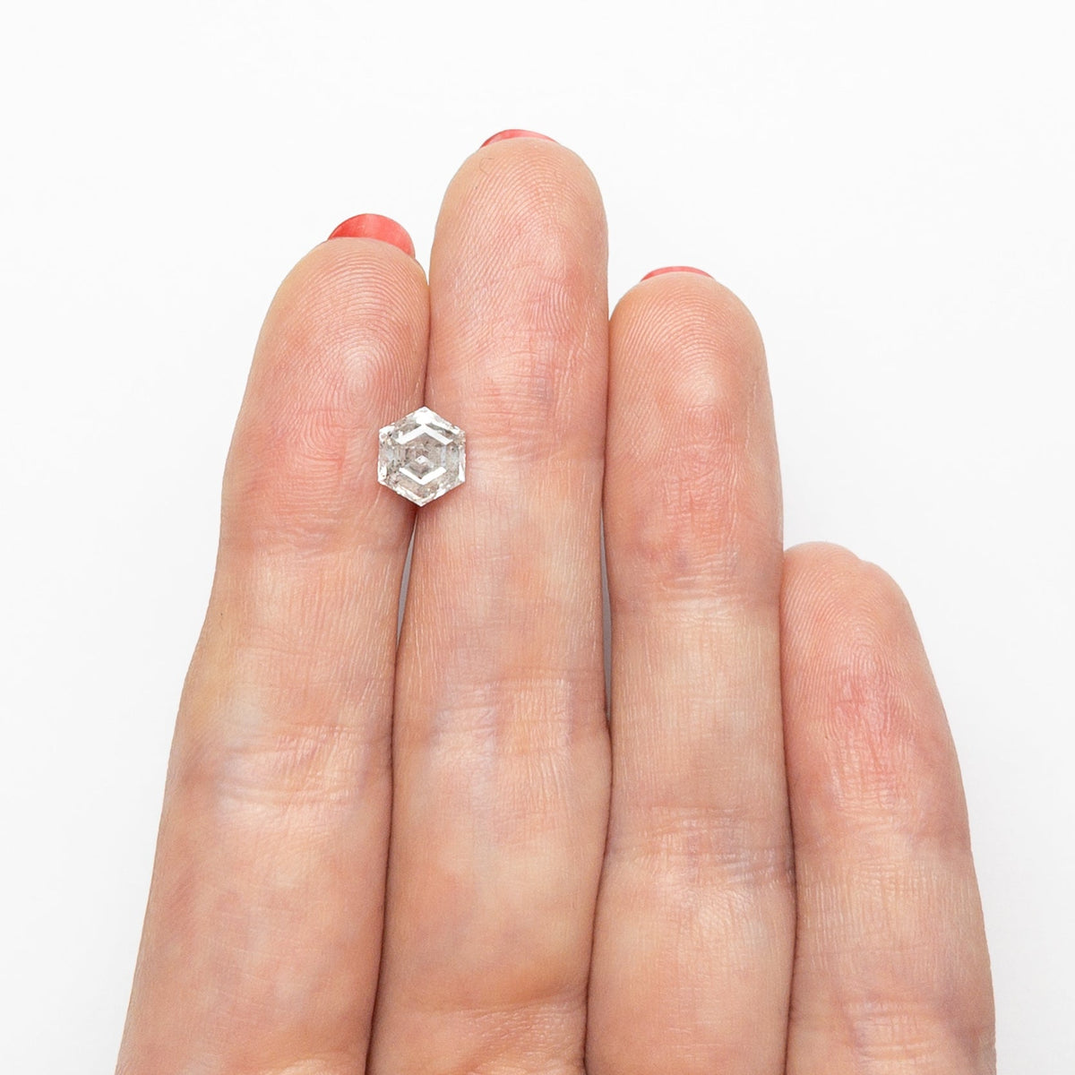 The 1.30ct 7.22x6.35x3.97mm Hexagon Step Cut 🇨🇦 26954-01 by East London jeweller Rachel Boston | Discover our collections of unique and timeless engagement rings, wedding rings, and modern fine jewellery.