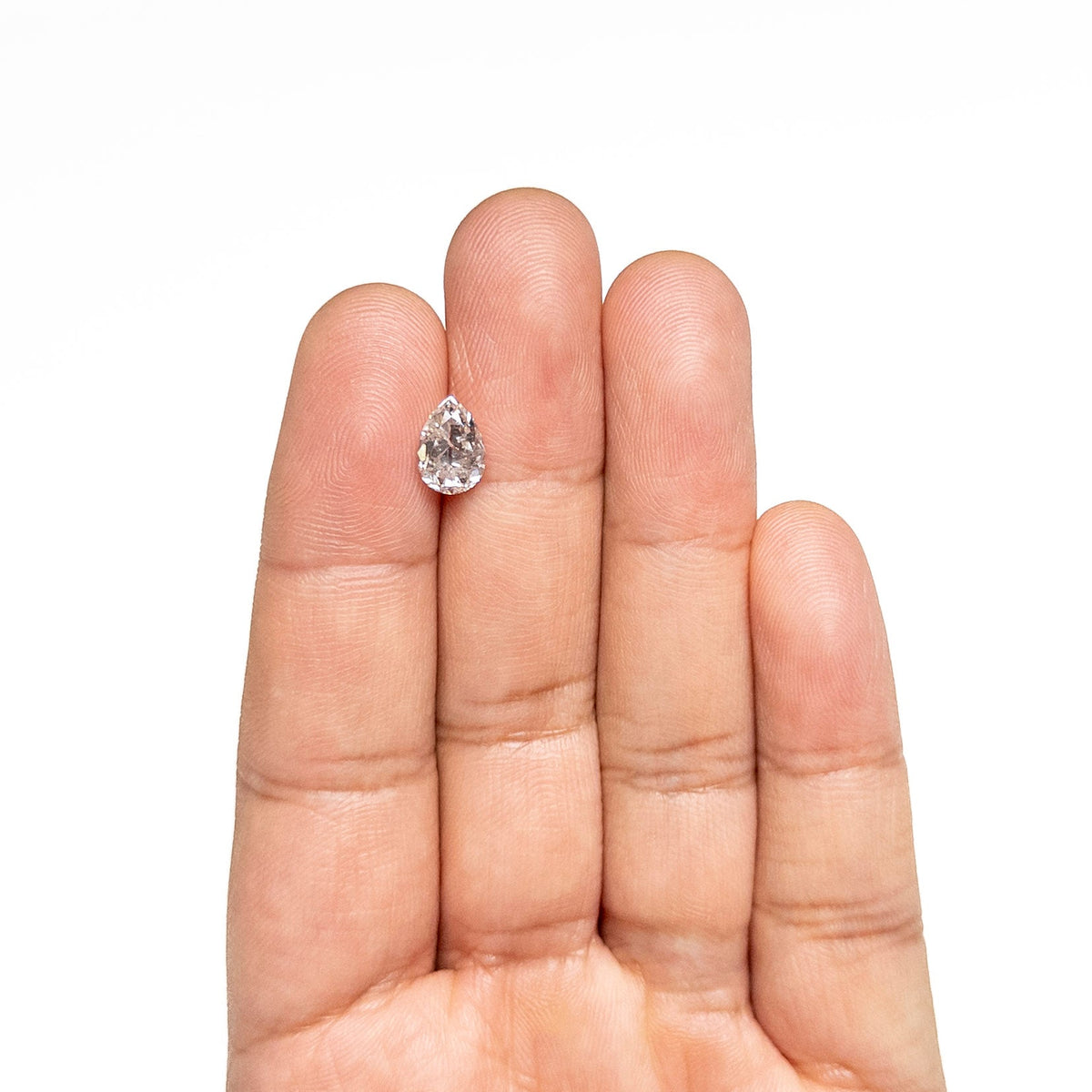 The 1.92ct 9.12x6.44x4.54mm Pear Brilliant 🇨🇦 26956-01 by East London jeweller Rachel Boston | Discover our collections of unique and timeless engagement rings, wedding rings, and modern fine jewellery.