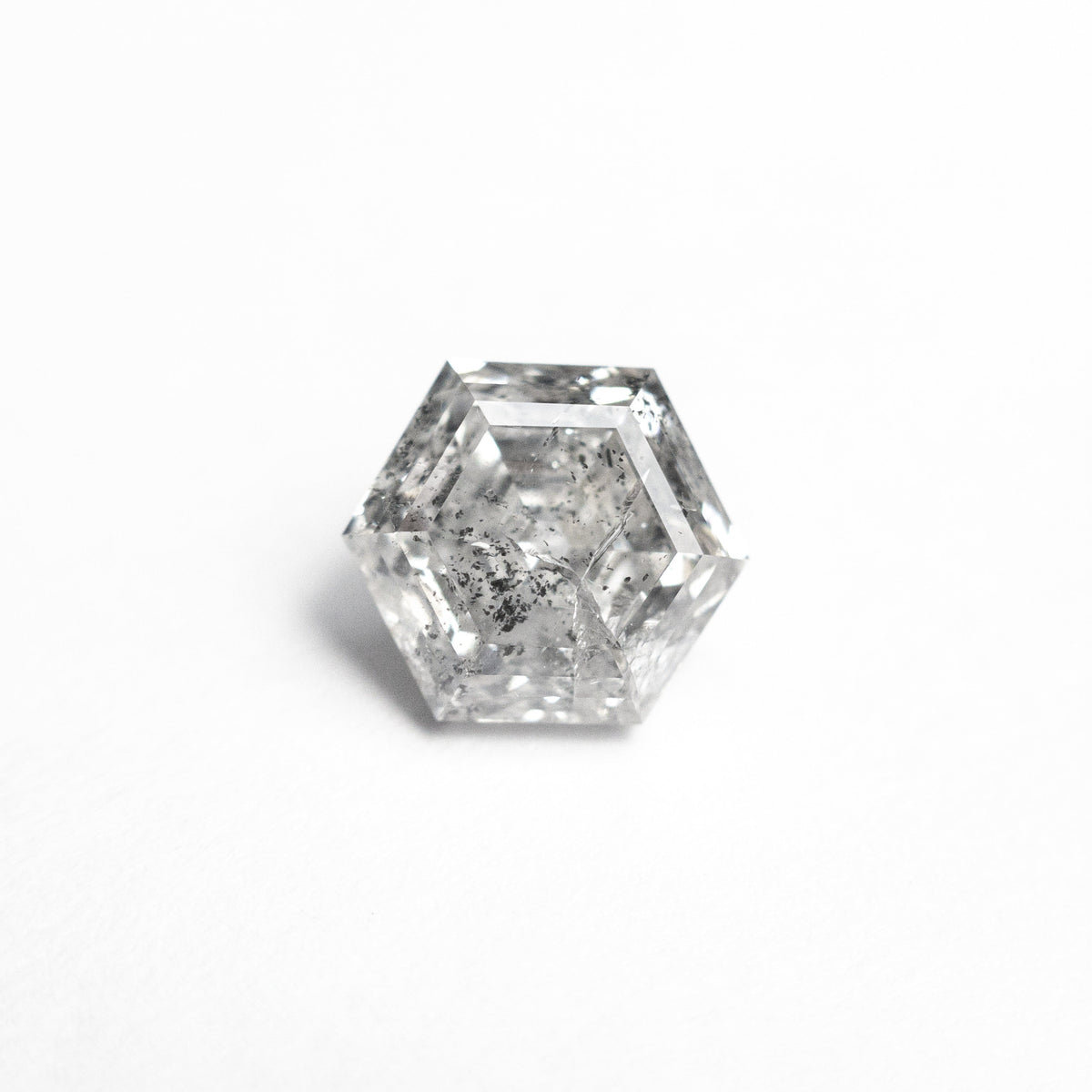 The 1.41ct 7.23x6.23x4.33mm Hexagon Step Cut 🇨🇦 26958-01 by East London jeweller Rachel Boston | Discover our collections of unique and timeless engagement rings, wedding rings, and modern fine jewellery.