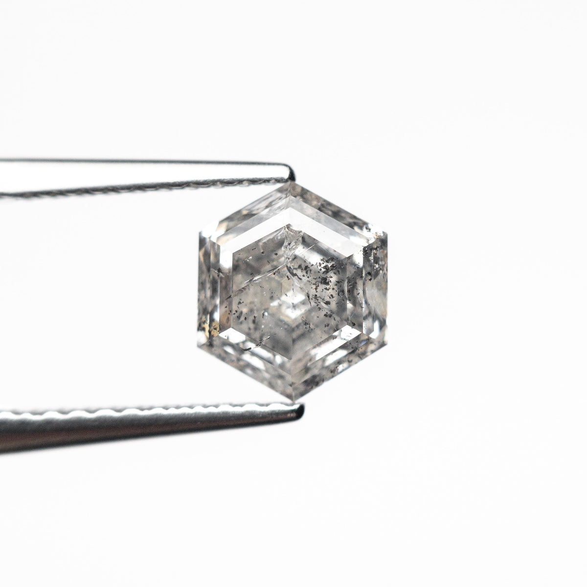 The 1.41ct 7.23x6.23x4.33mm Hexagon Step Cut 🇨🇦 26958-01 by East London jeweller Rachel Boston | Discover our collections of unique and timeless engagement rings, wedding rings, and modern fine jewellery.