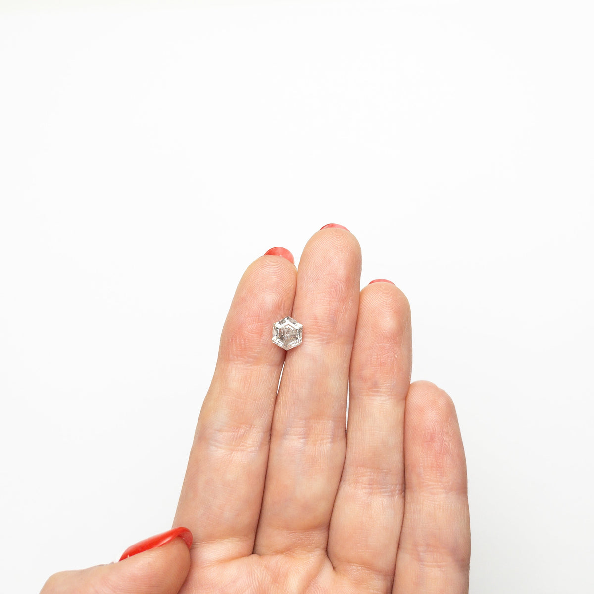 The 1.41ct 7.23x6.23x4.33mm Hexagon Step Cut 🇨🇦 26958-01 by East London jeweller Rachel Boston | Discover our collections of unique and timeless engagement rings, wedding rings, and modern fine jewellery.