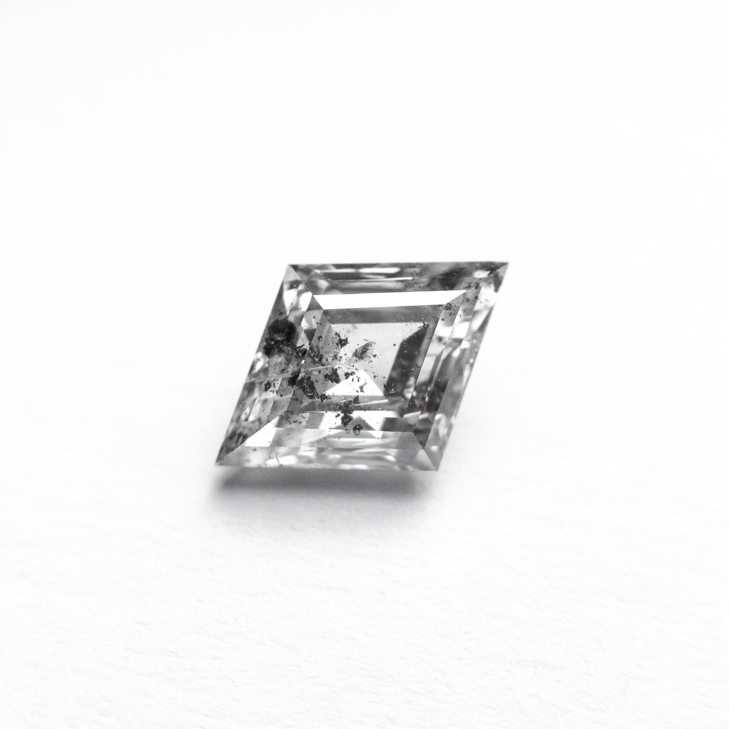 The 0.88ct 8.74x6.23x3.23mm Lozenge Step Cut 🇨🇦 26962-01 by East London jeweller Rachel Boston | Discover our collections of unique and timeless engagement rings, wedding rings, and modern fine jewellery.