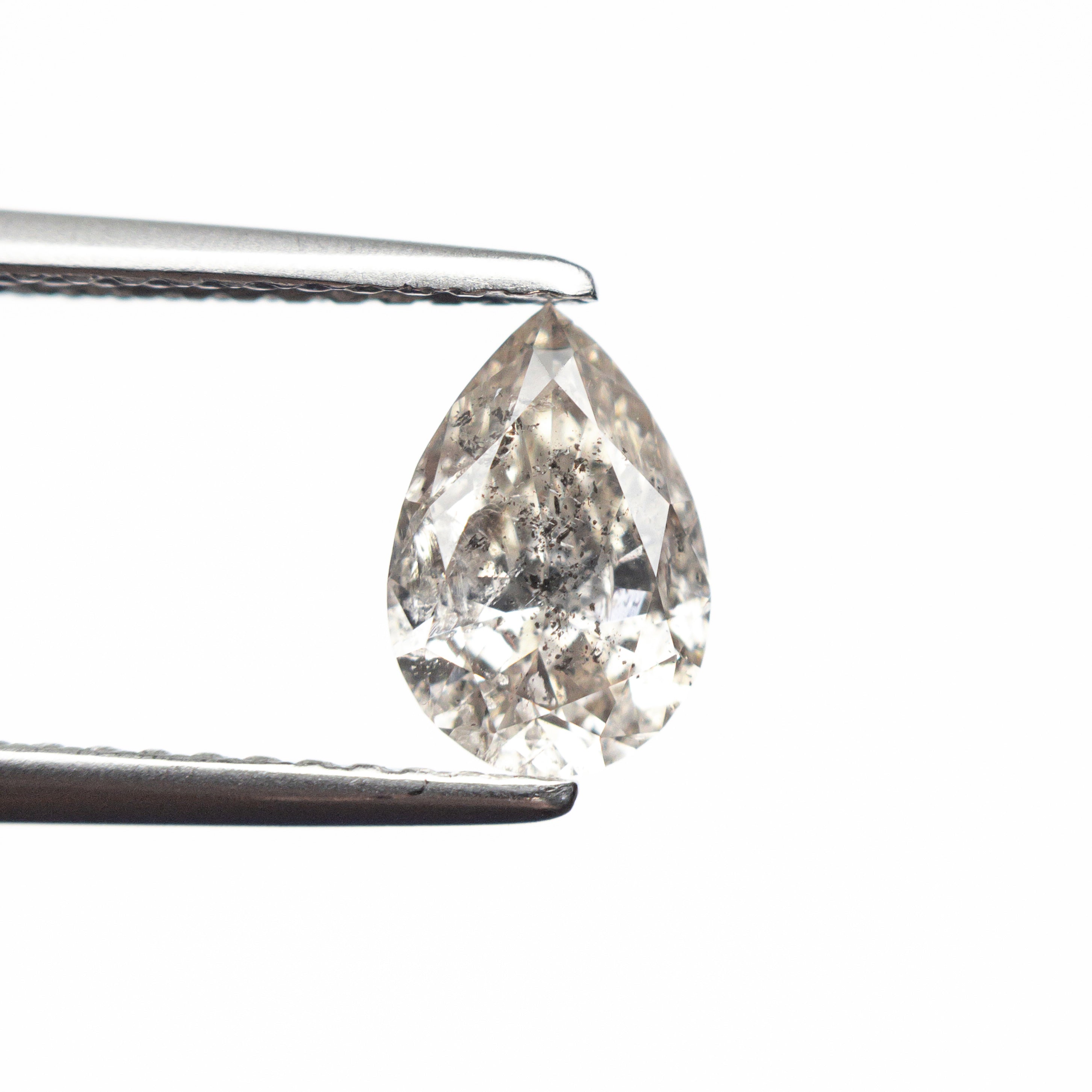 The 0.92ct 8.05x5.48x3.41mm Pear Brilliant 🇨🇦 26977-01 by East London jeweller Rachel Boston | Discover our collections of unique and timeless engagement rings, wedding rings, and modern fine jewellery.
