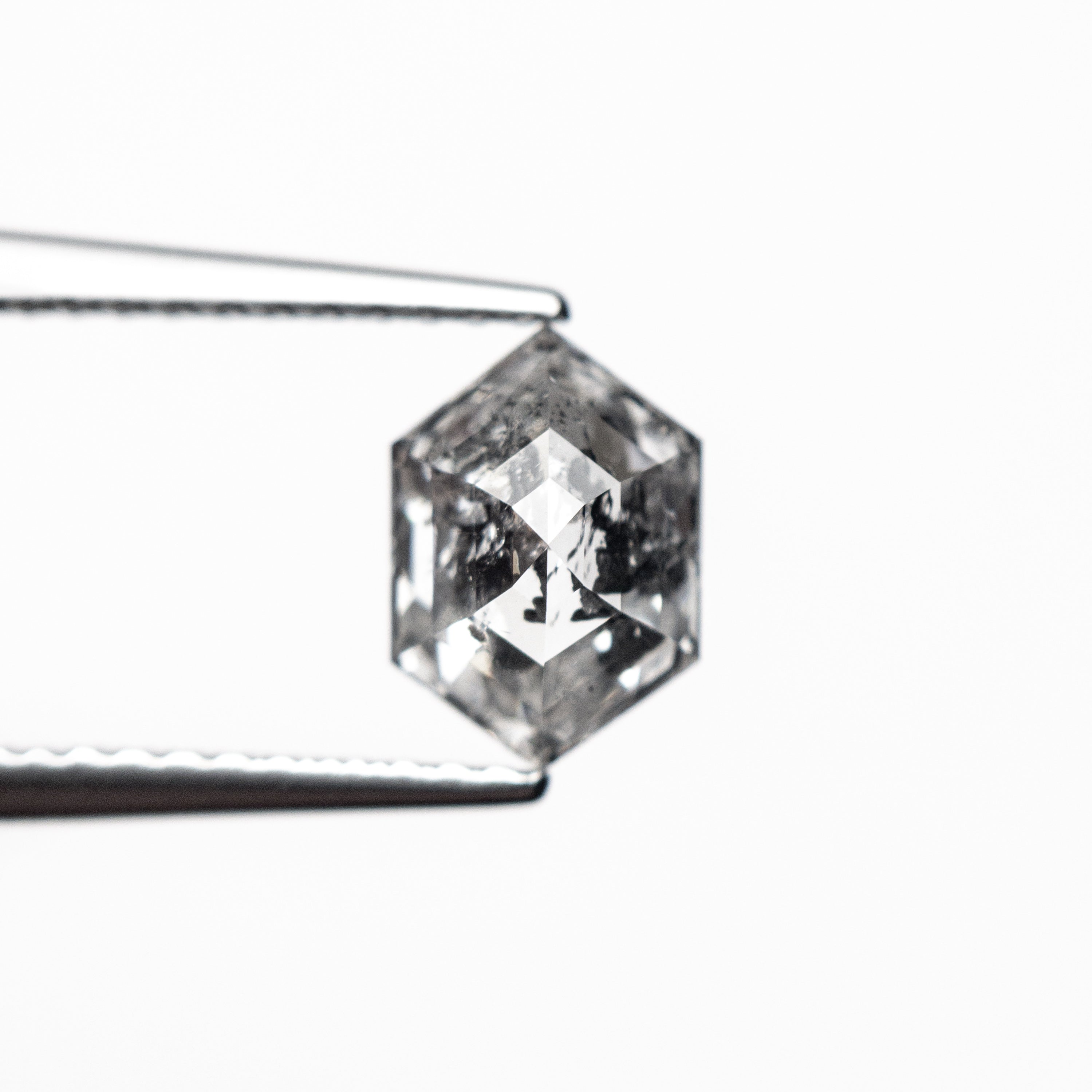 The 1.09ct 8.03x5.60x3.41mm Hexagon Step Cut 🇨🇦 26983-01 by East London jeweller Rachel Boston | Discover our collections of unique and timeless engagement rings, wedding rings, and modern fine jewellery.