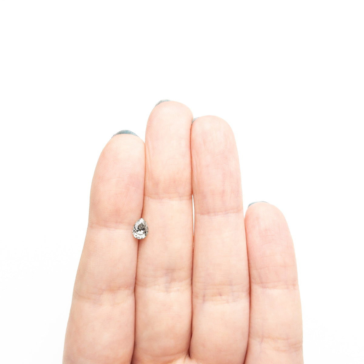 The 0.54ct 6.00x4.51x3.05mm Pear Brilliant 🇨🇦 26993-01 by East London jeweller Rachel Boston | Discover our collections of unique and timeless engagement rings, wedding rings, and modern fine jewellery.