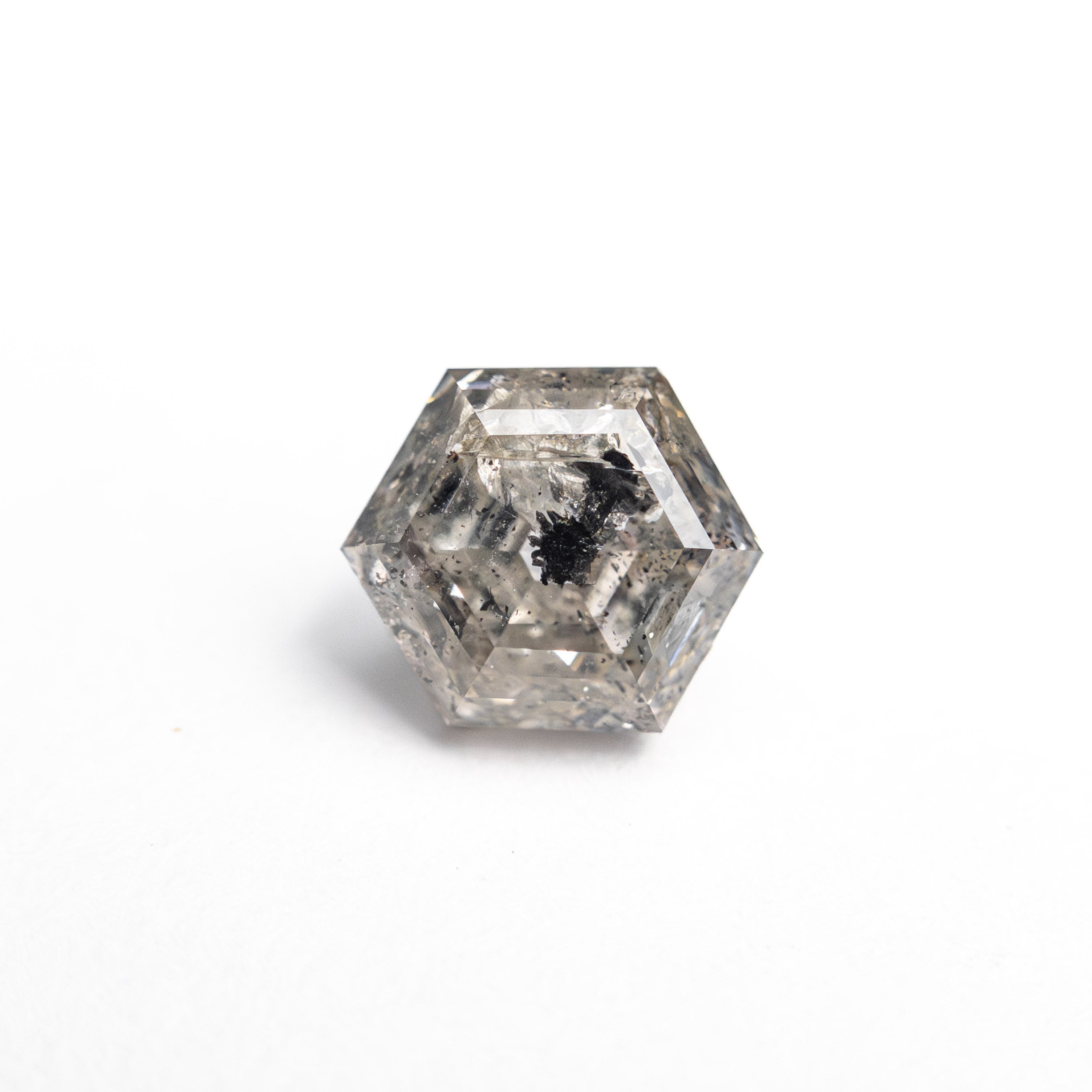 The 1.08ct 6.53x5.66x3.89mm Hexagon Step Cut 🇨🇦 27000-01 by East London jeweller Rachel Boston | Discover our collections of unique and timeless engagement rings, wedding rings, and modern fine jewellery.