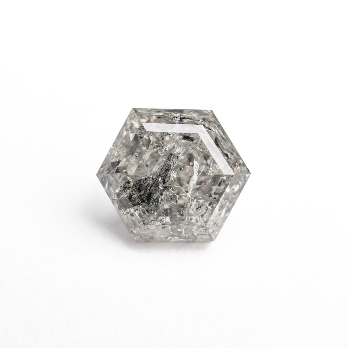 The 1.47ct 7.20x6.21x4.24mm Hexagon Step Cut 🇨🇦 27006-01 by East London jeweller Rachel Boston | Discover our collections of unique and timeless engagement rings, wedding rings, and modern fine jewellery.