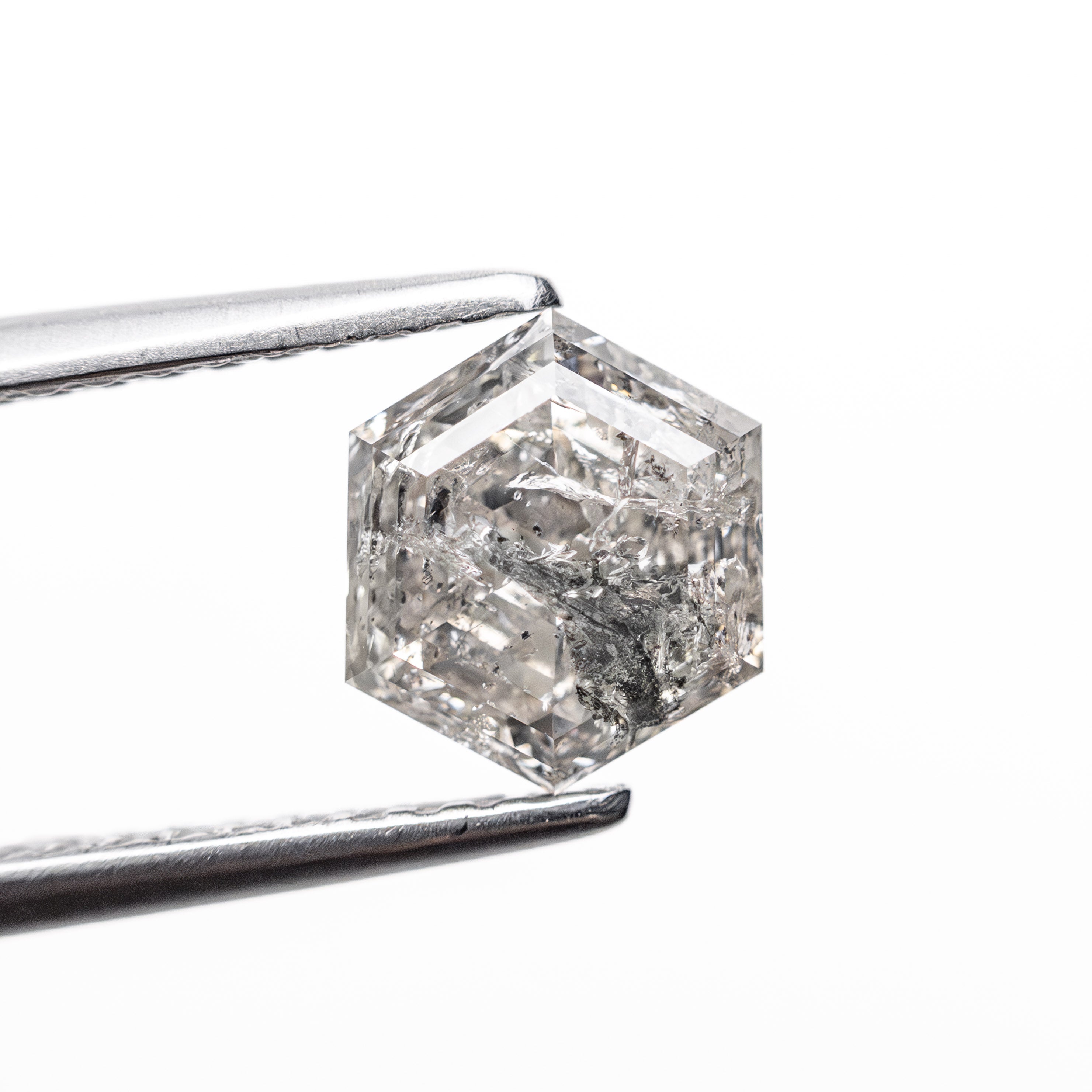 The 1.47ct 7.20x6.21x4.24mm Hexagon Step Cut 🇨🇦 27006-01 by East London jeweller Rachel Boston | Discover our collections of unique and timeless engagement rings, wedding rings, and modern fine jewellery.