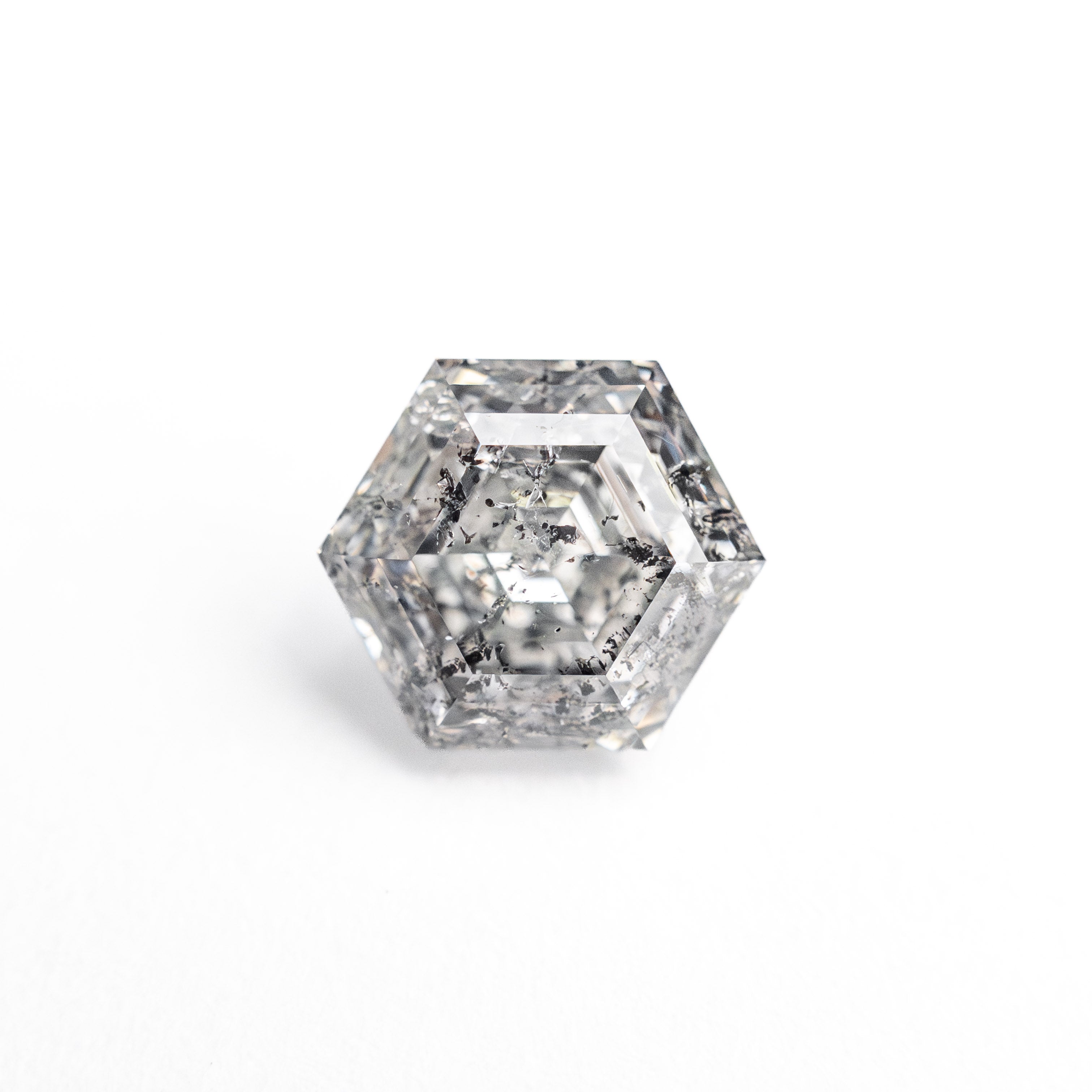 The 1.29ct 7.04x6.03x4.15mm Hexagon Step Cut 🇨🇦 27007-01 by East London jeweller Rachel Boston | Discover our collections of unique and timeless engagement rings, wedding rings, and modern fine jewellery.