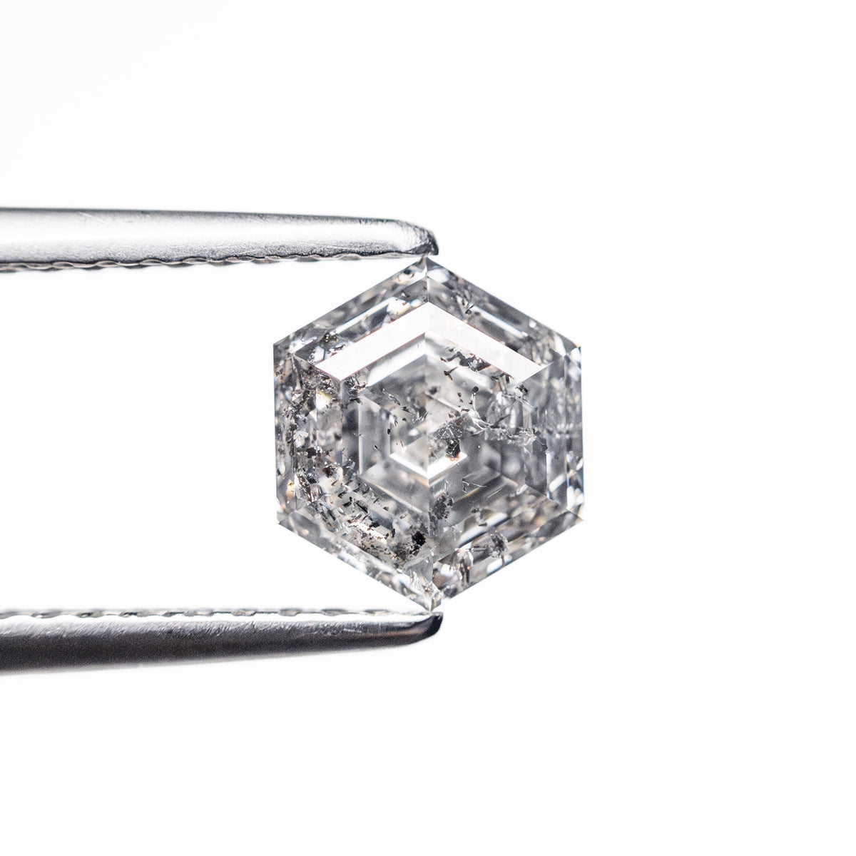 The 1.29ct 7.04x6.03x4.15mm Hexagon Step Cut 🇨🇦 27007-01 by East London jeweller Rachel Boston | Discover our collections of unique and timeless engagement rings, wedding rings, and modern fine jewellery.