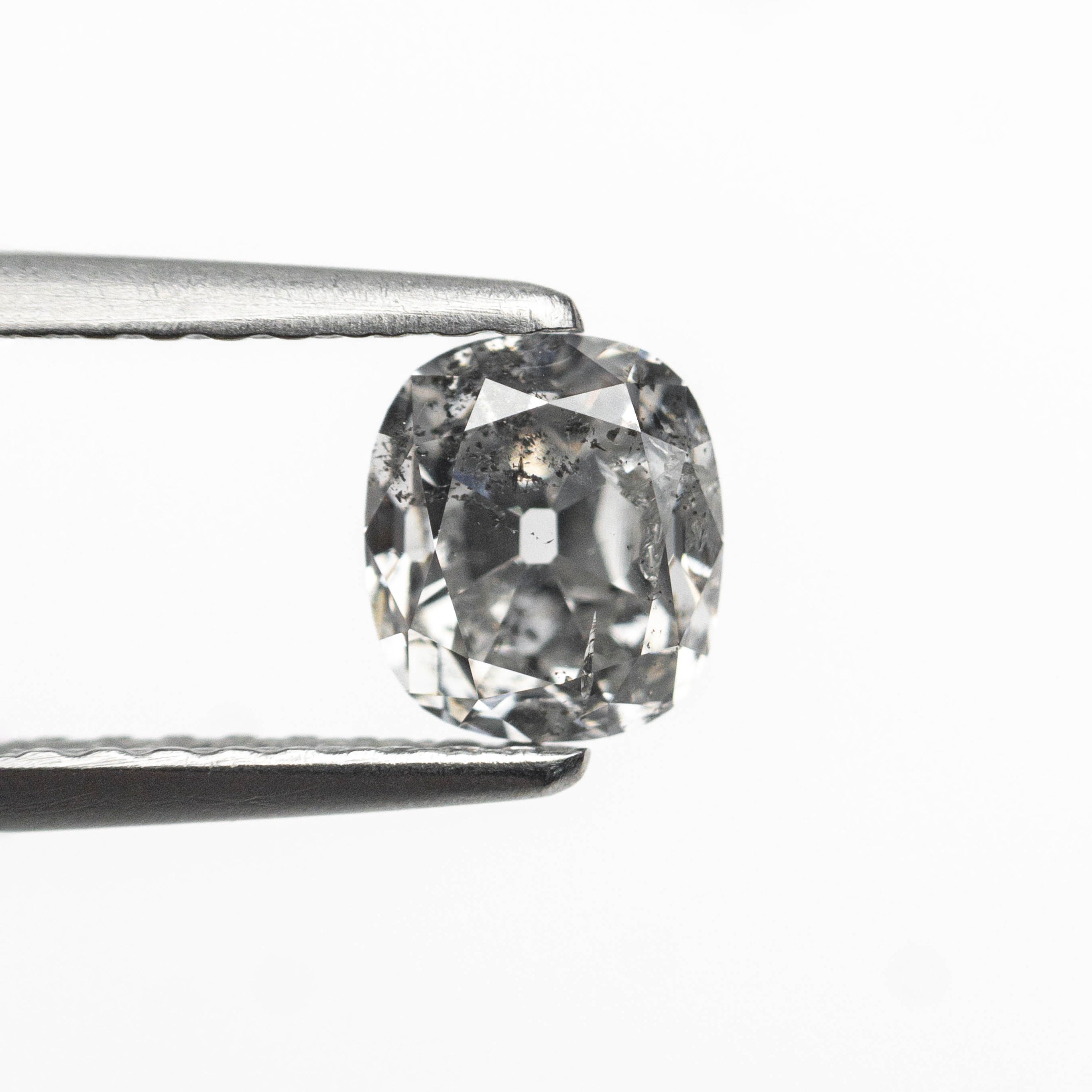 The 0.75ct 5.55x4.90x3.38mm Modern Antique Old Mine Cut 🇨🇦 27008-01 by East London jeweller Rachel Boston | Discover our collections of unique and timeless engagement rings, wedding rings, and modern fine jewellery.