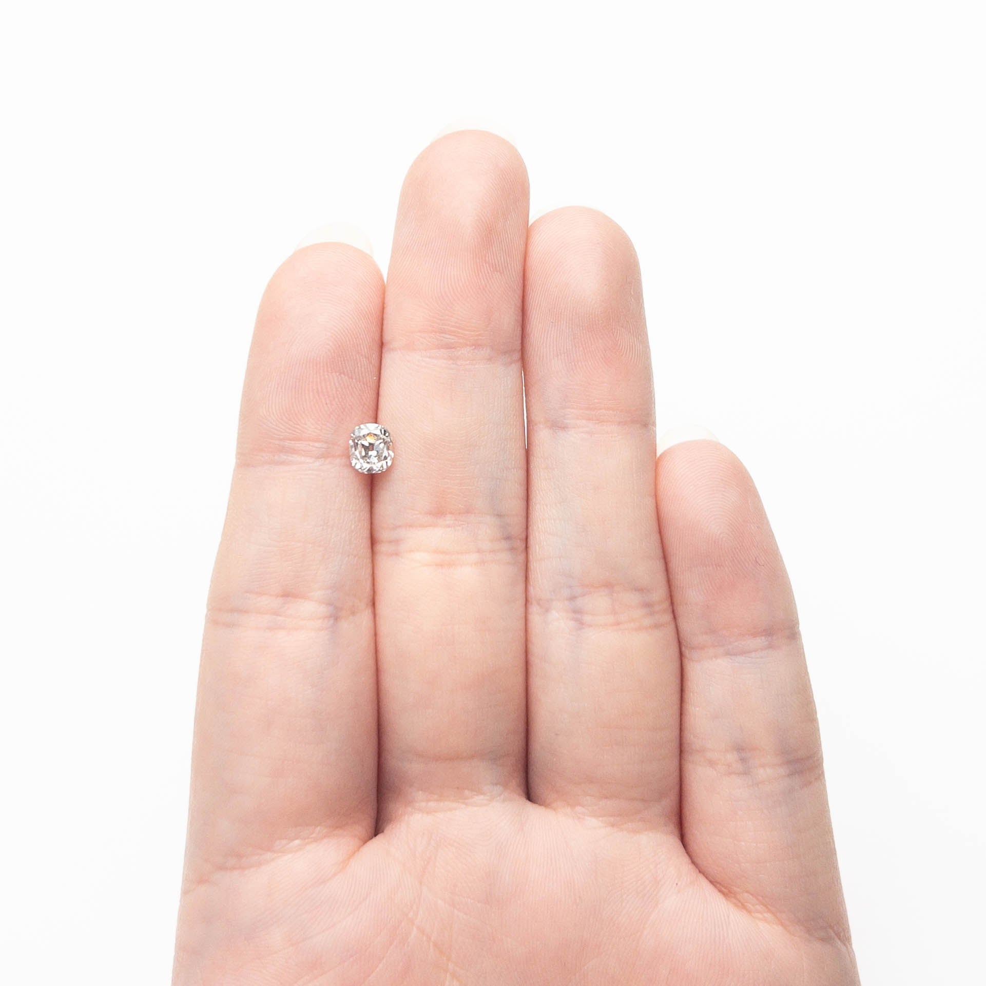 The 0.75ct 5.55x4.90x3.38mm Modern Antique Old Mine Cut 🇨🇦 27008-01 by East London jeweller Rachel Boston | Discover our collections of unique and timeless engagement rings, wedding rings, and modern fine jewellery.