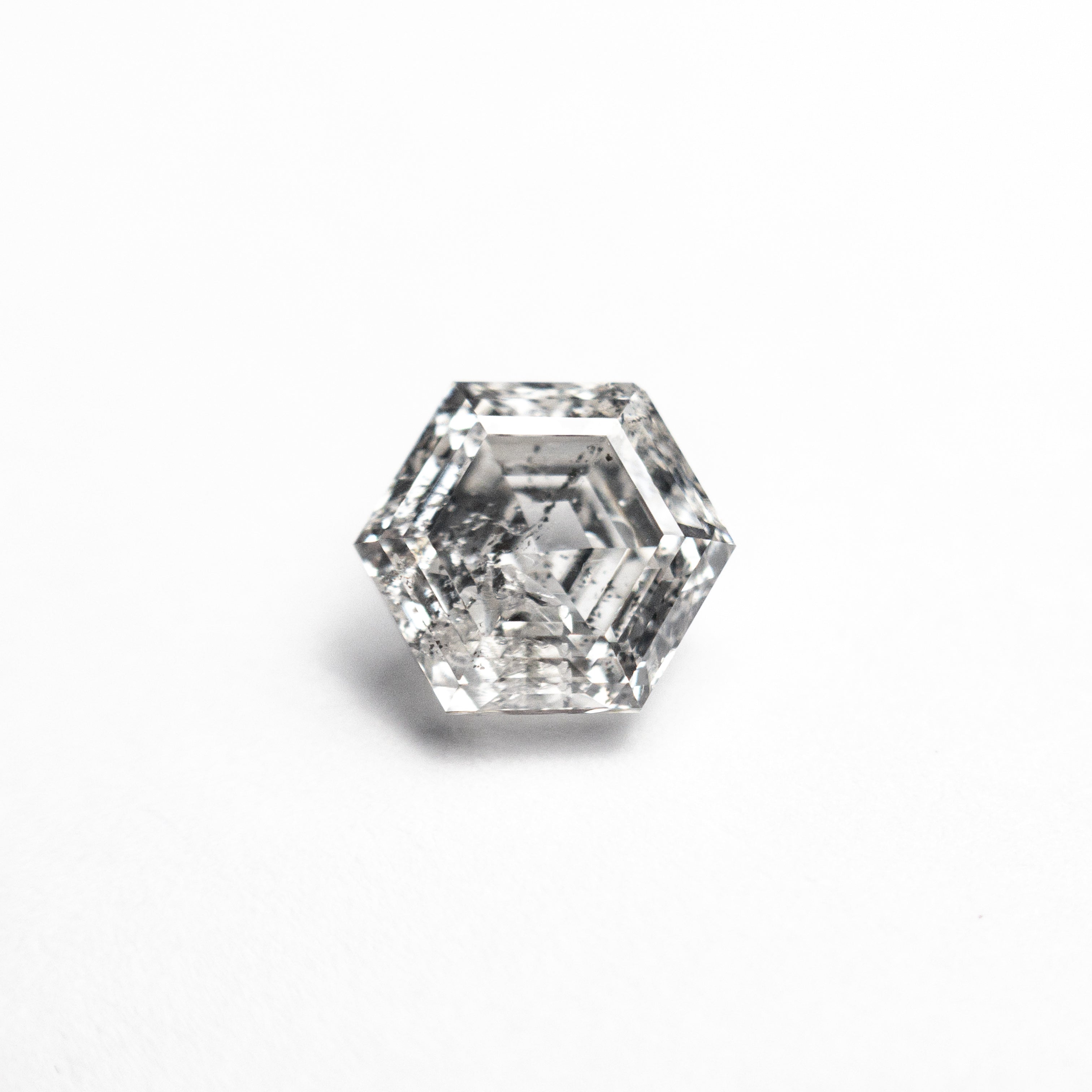 The 1.04ct 6.69x5.68x3.62mm Hexagon Step Cut 🇨🇦 27013-01 by East London jeweller Rachel Boston | Discover our collections of unique and timeless engagement rings, wedding rings, and modern fine jewellery.