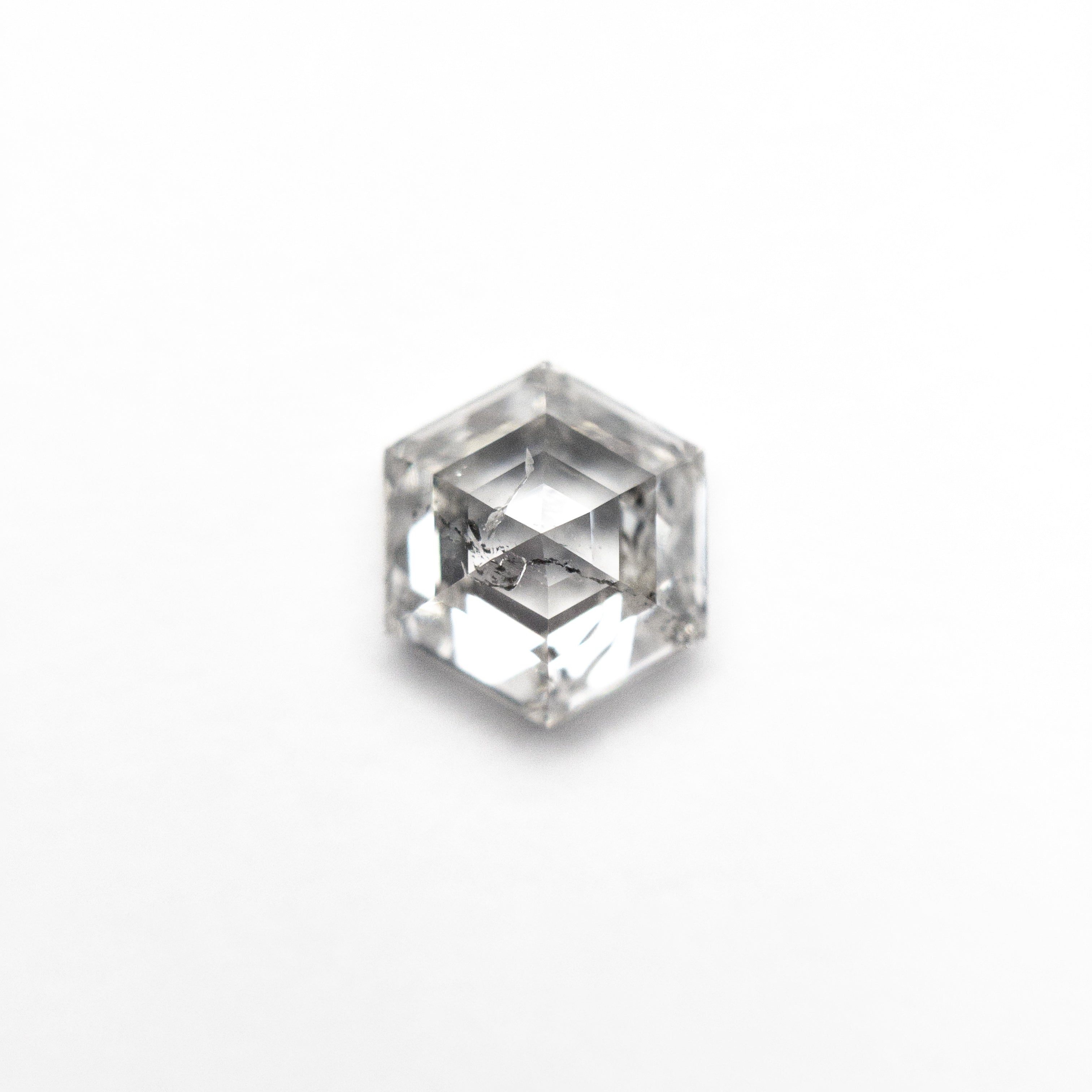 The 1.04ct 6.69x5.68x3.62mm Hexagon Step Cut 🇨🇦 27013-01 by East London jeweller Rachel Boston | Discover our collections of unique and timeless engagement rings, wedding rings, and modern fine jewellery.