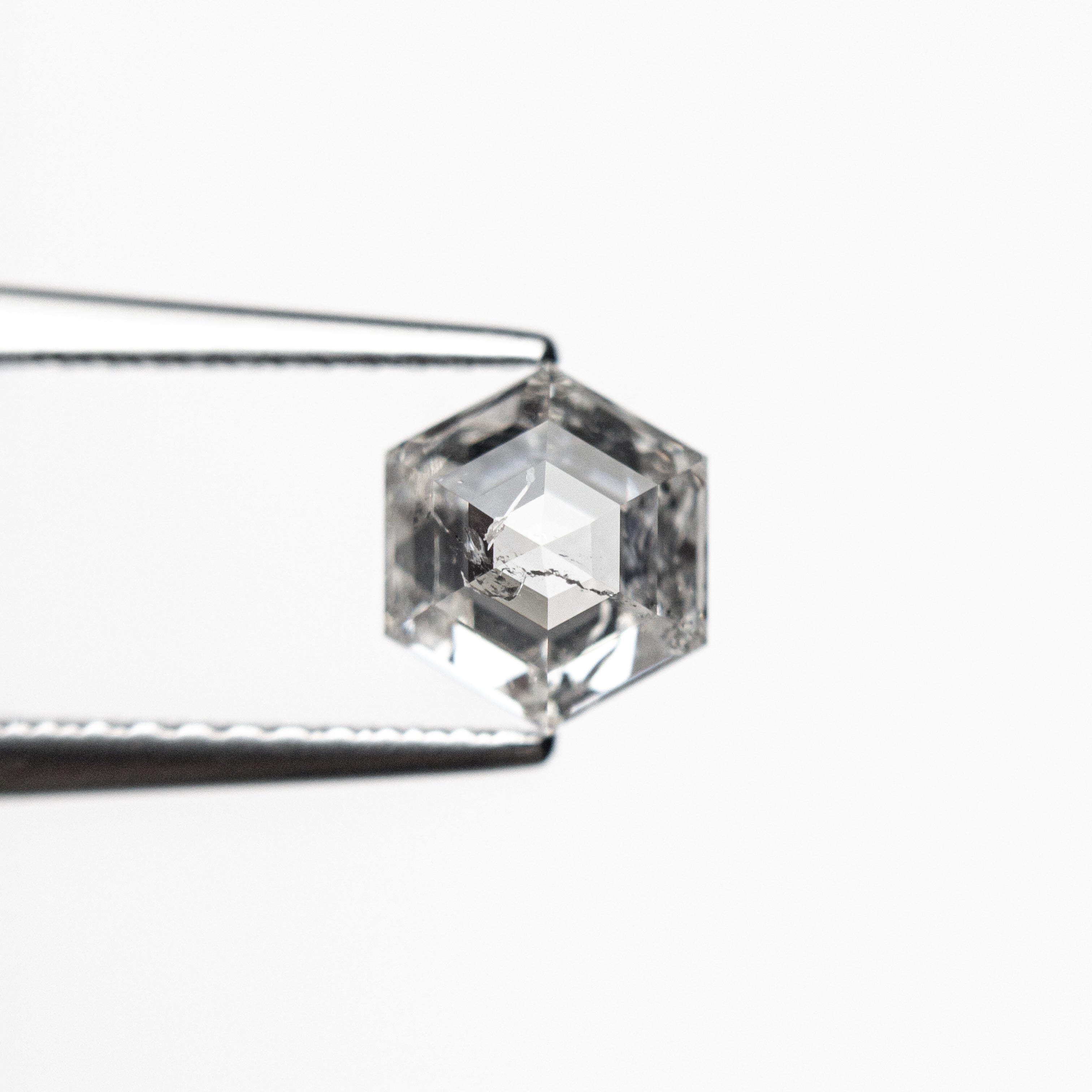 The 1.04ct 6.69x5.68x3.62mm Hexagon Step Cut 🇨🇦 27013-01 by East London jeweller Rachel Boston | Discover our collections of unique and timeless engagement rings, wedding rings, and modern fine jewellery.
