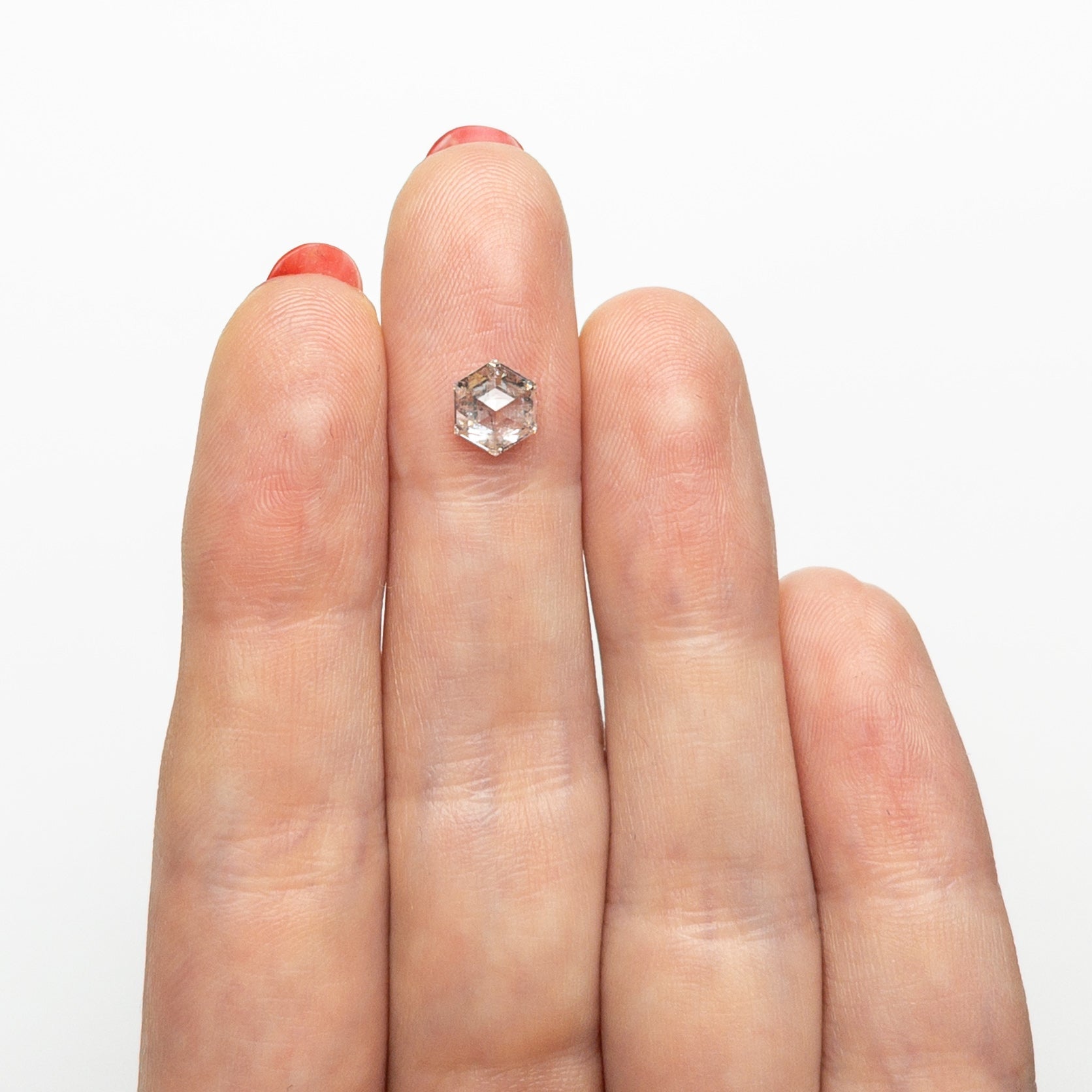 The 1.04ct 6.69x5.68x3.62mm Hexagon Step Cut 🇨🇦 27013-01 by East London jeweller Rachel Boston | Discover our collections of unique and timeless engagement rings, wedding rings, and modern fine jewellery.