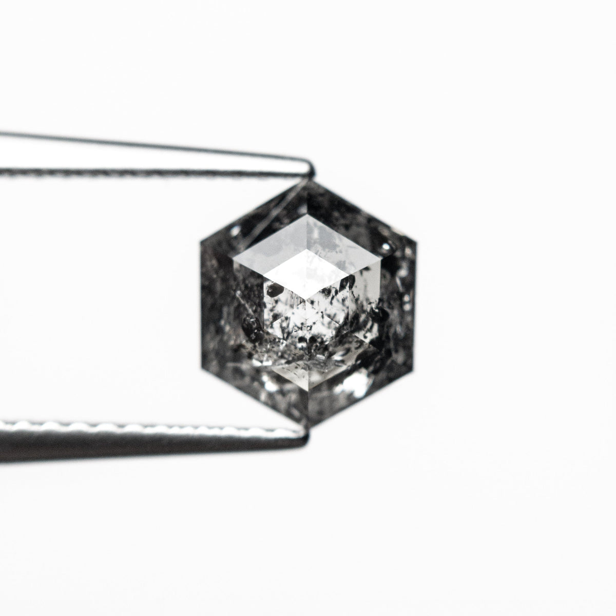 The 1.88ct 8.20x7.06x4.16mm Hexagon Step Cut 🇨🇦 27020-01 by East London jeweller Rachel Boston | Discover our collections of unique and timeless engagement rings, wedding rings, and modern fine jewellery.