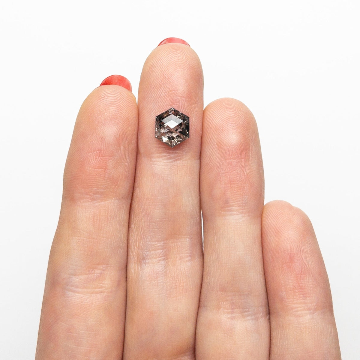 The 1.88ct 8.20x7.06x4.16mm Hexagon Step Cut 🇨🇦 27020-01 by East London jeweller Rachel Boston | Discover our collections of unique and timeless engagement rings, wedding rings, and modern fine jewellery.