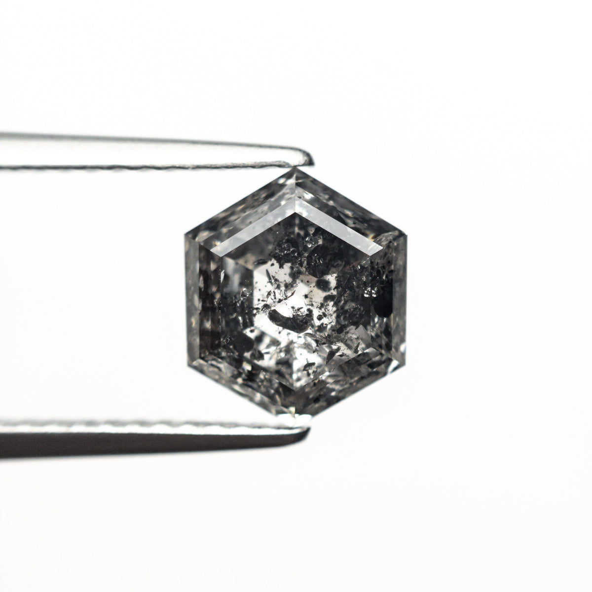 The 1.88ct 8.20x7.06x4.16mm Hexagon Step Cut 🇨🇦 27020-01 by East London jeweller Rachel Boston | Discover our collections of unique and timeless engagement rings, wedding rings, and modern fine jewellery.