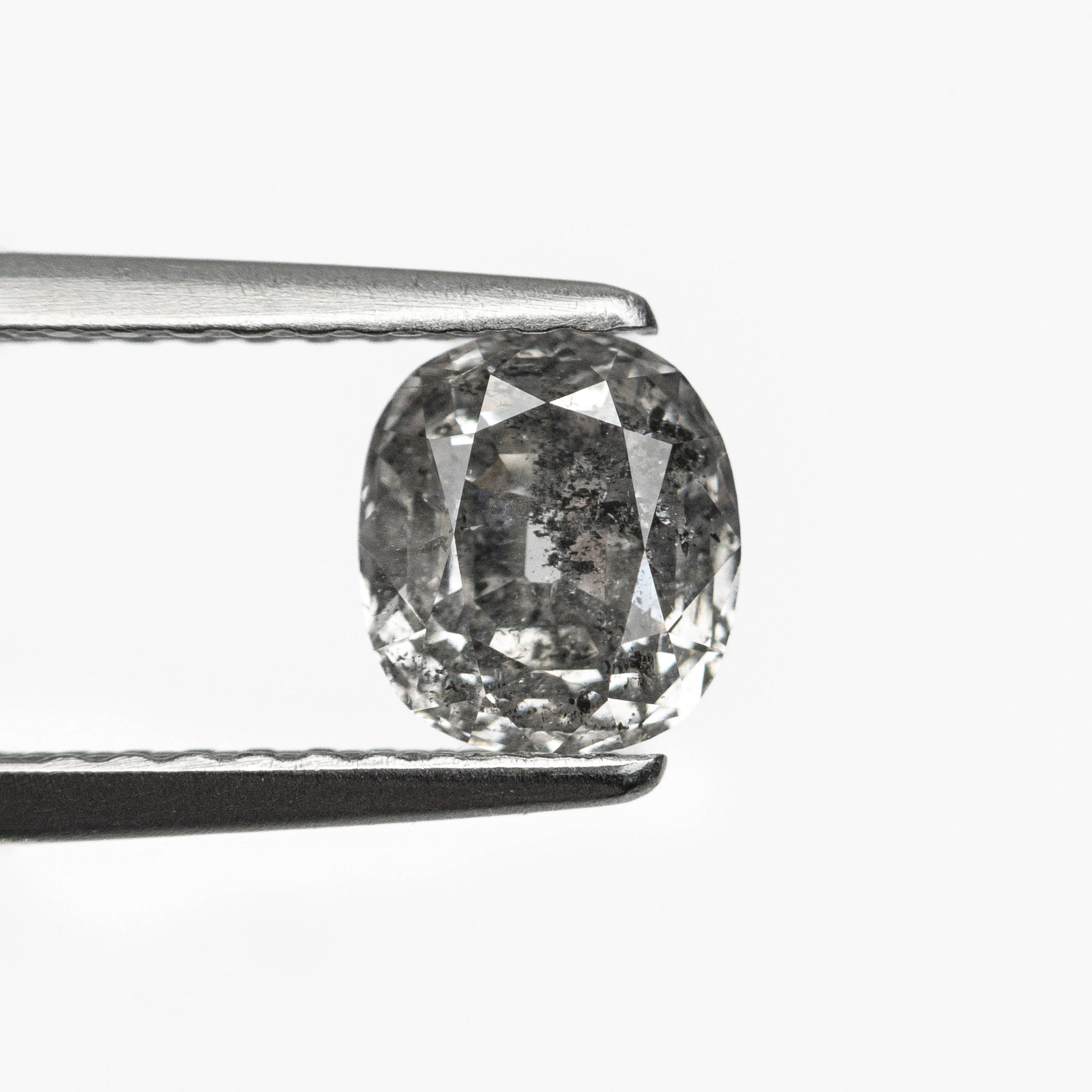 The 0.81ct 5.91x5.31x3.18mm Modern Antique Old Mine Cut 🇨🇦 27025-01 by East London jeweller Rachel Boston | Discover our collections of unique and timeless engagement rings, wedding rings, and modern fine jewellery.