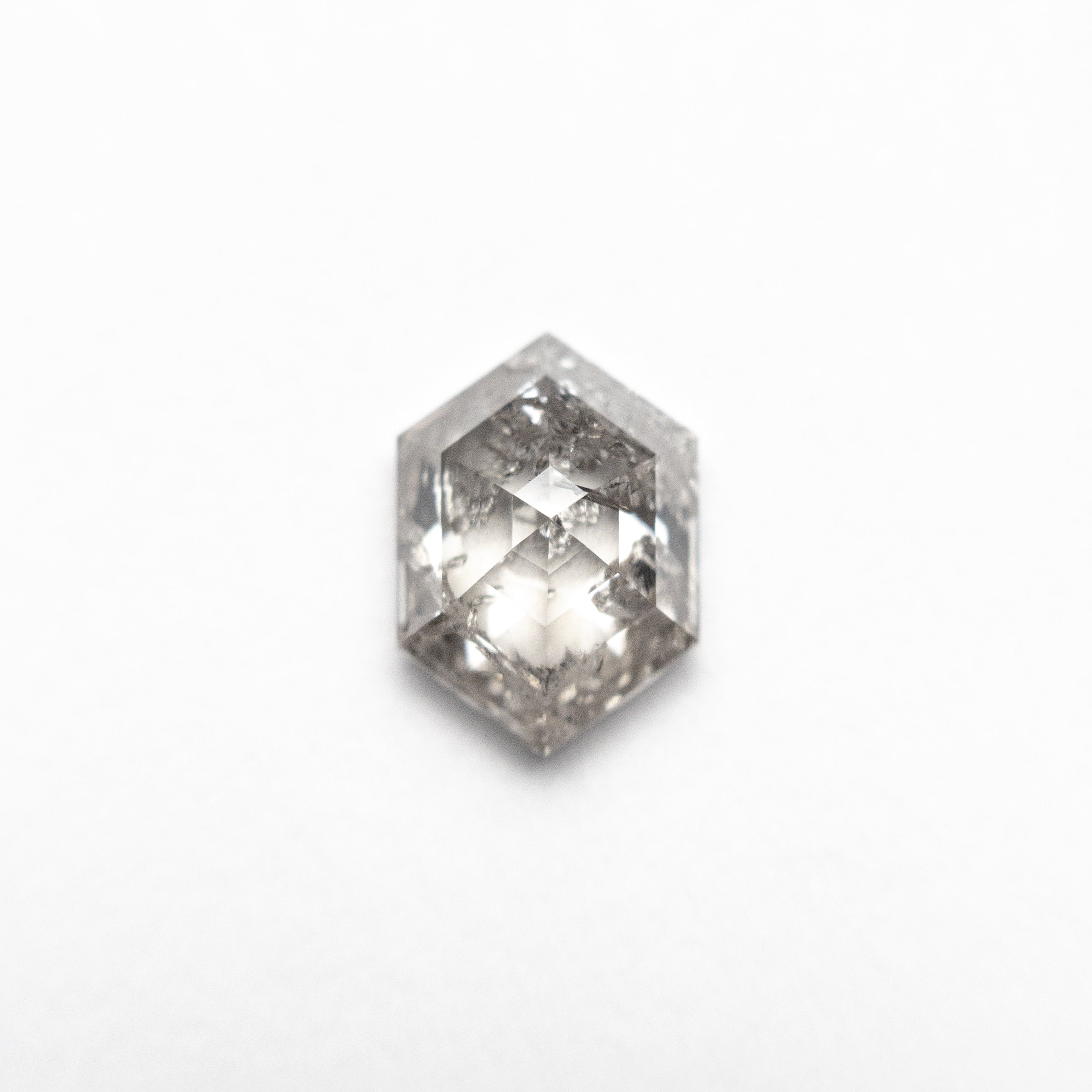 The 0.95ct 7.45x5.30x3.11mm Hexagon Step Cut 🇨🇦 27035-01 by East London jeweller Rachel Boston | Discover our collections of unique and timeless engagement rings, wedding rings, and modern fine jewellery.